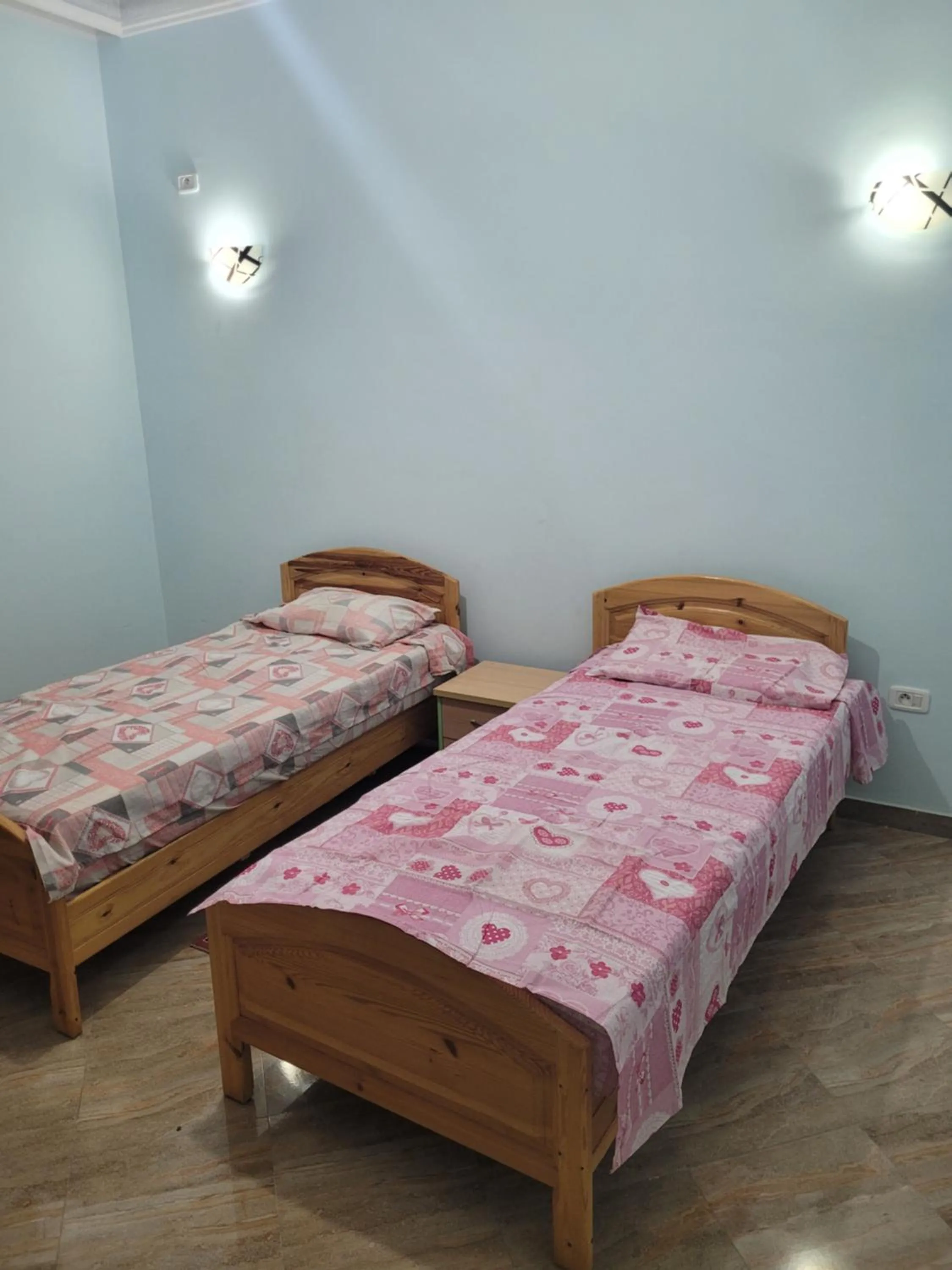 Bed in Miriam Apartments