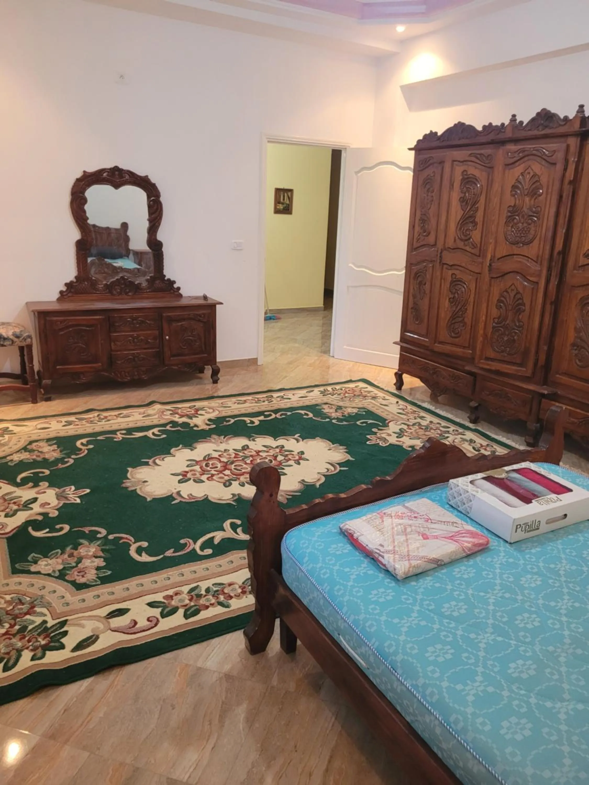 Bed in Miriam Apartments