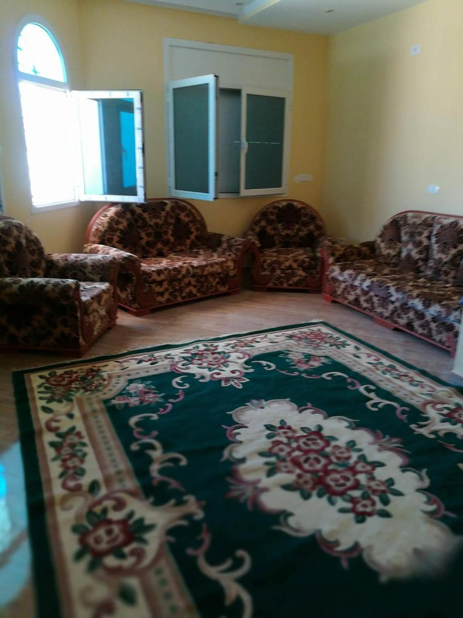Living room, Bed in Miriam Apartments