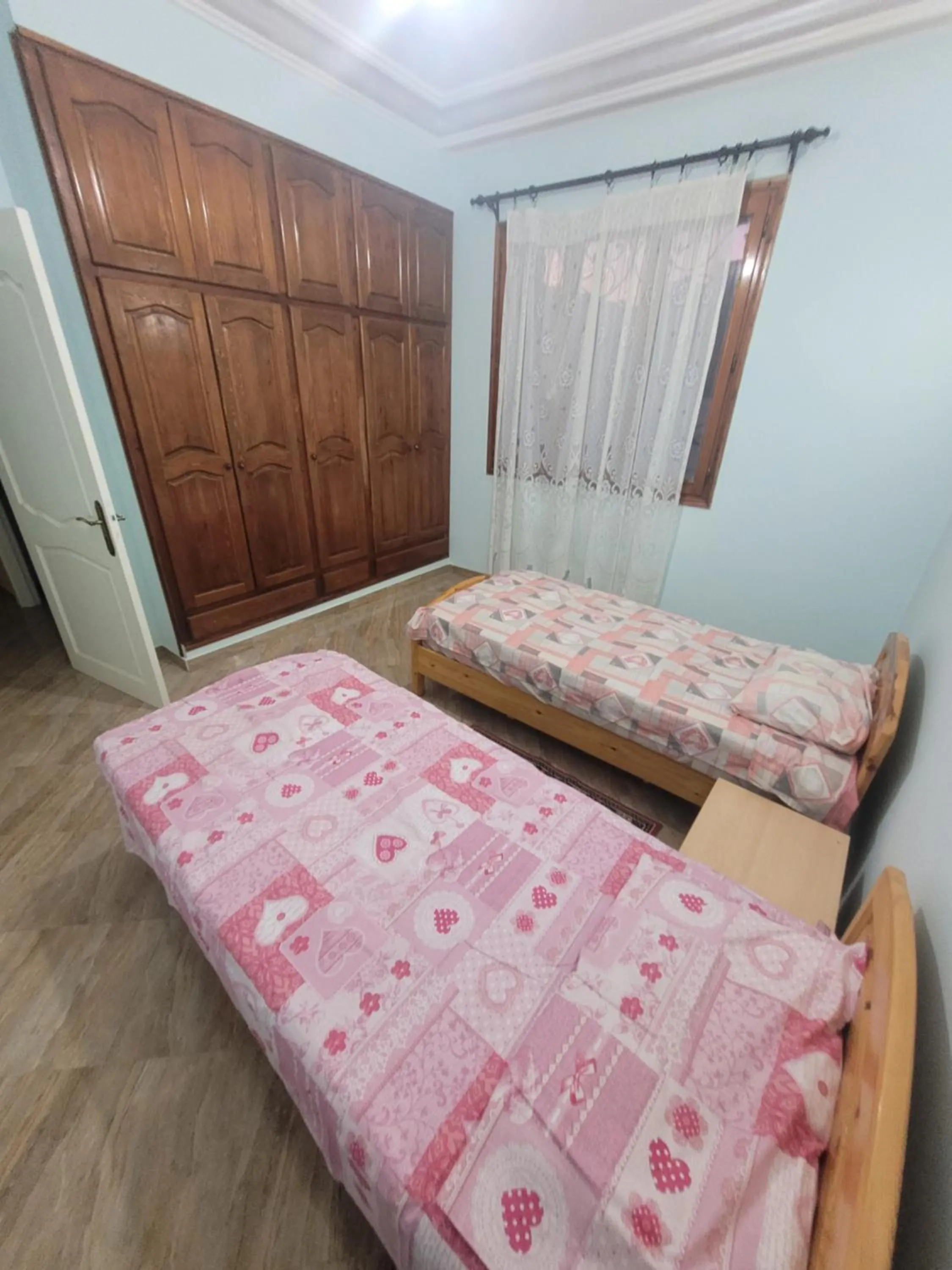 Bed in Miriam Apartments