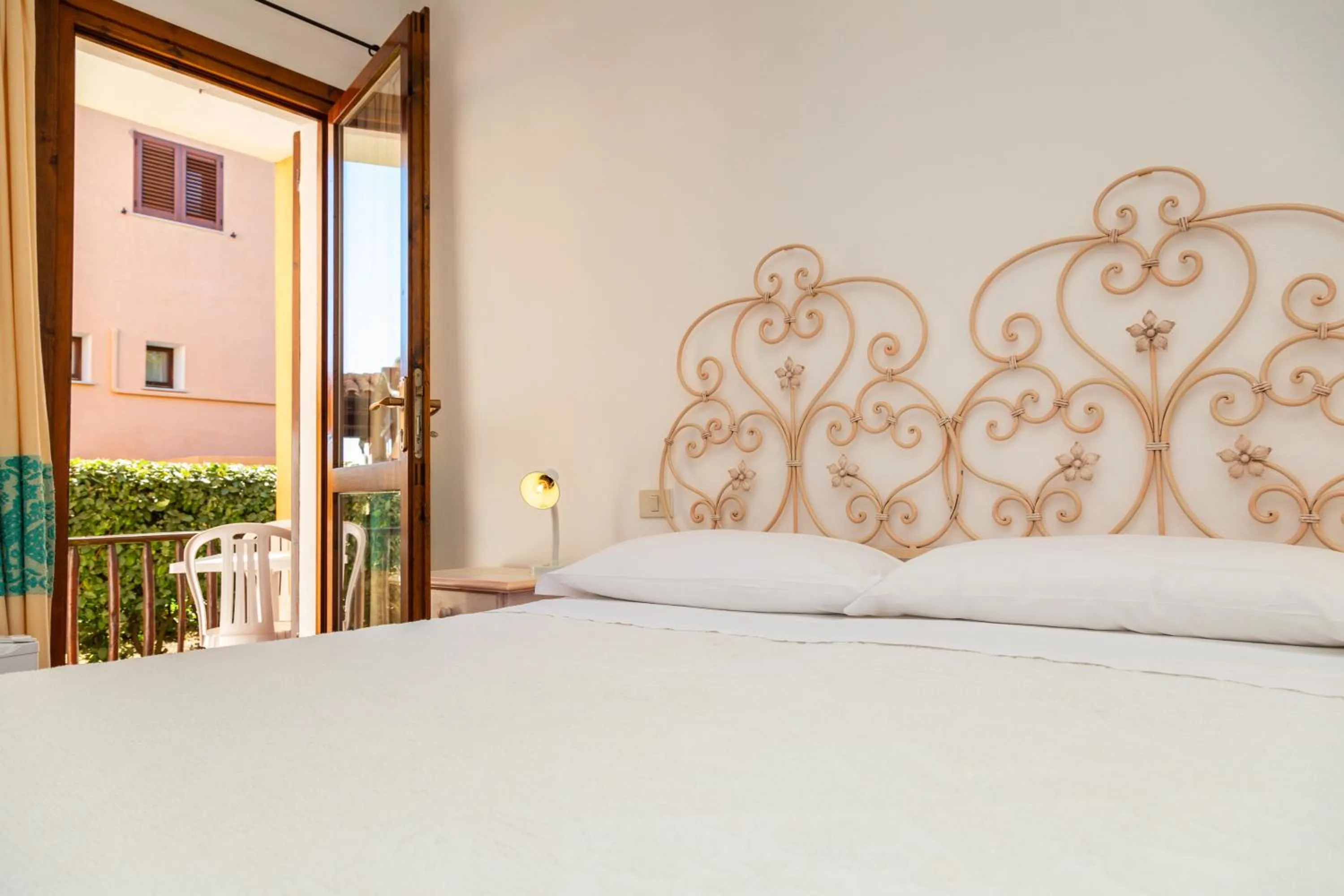 Bed in Hotel Piccolo Pevero