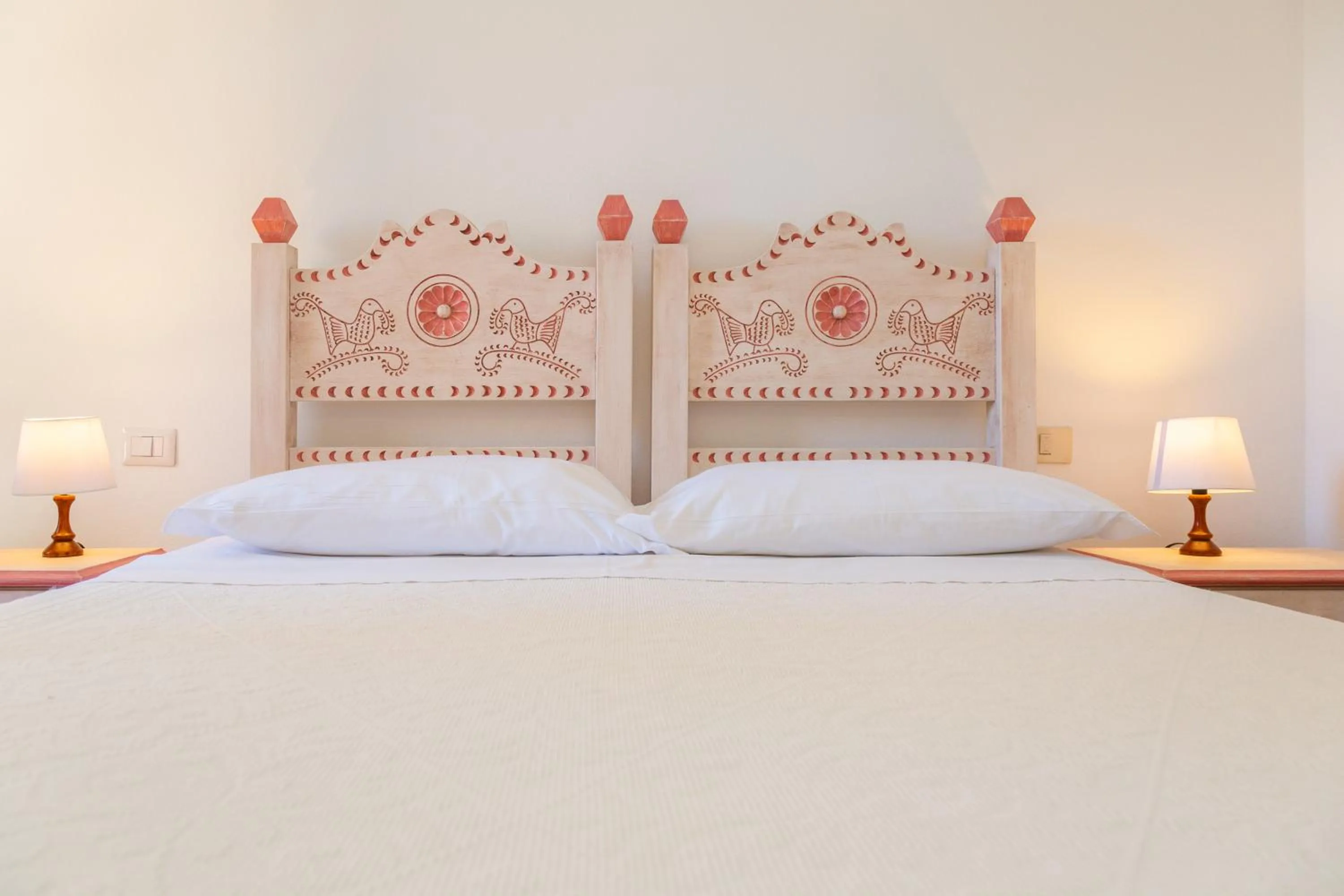 Bed in Hotel Piccolo Pevero