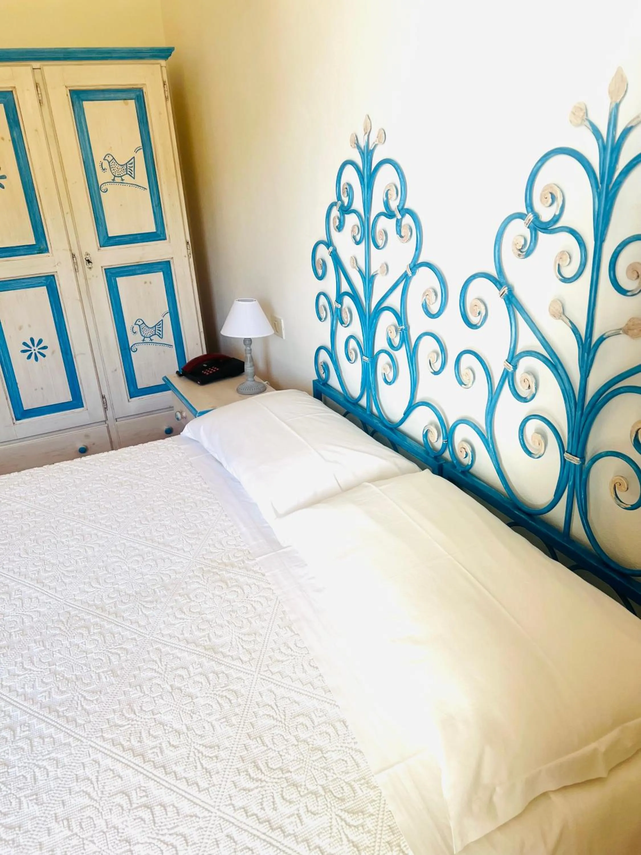 Bed in Hotel Piccolo Pevero