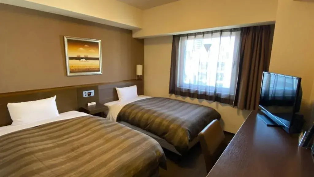 Twin Room - single occupancy - Non-Smoking in Hotel Route-Inn Nagoya Imaike Ekimae Twin Room - single occupancy - Non-Smoking in Hotel Route-Inn Nagoya Imaike Ekimae