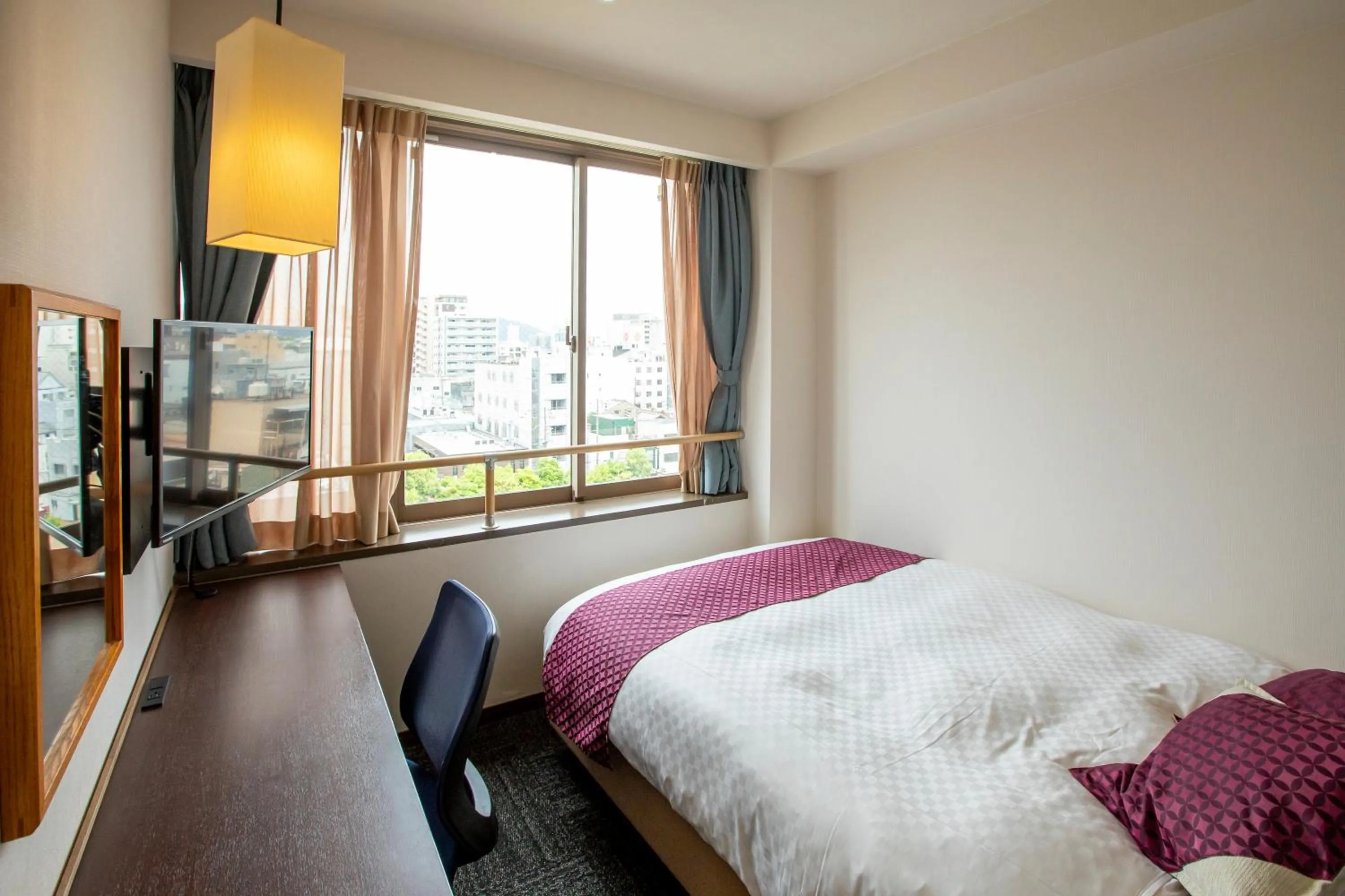 Photo of the whole room, Bed in Hotel Claire Higasa