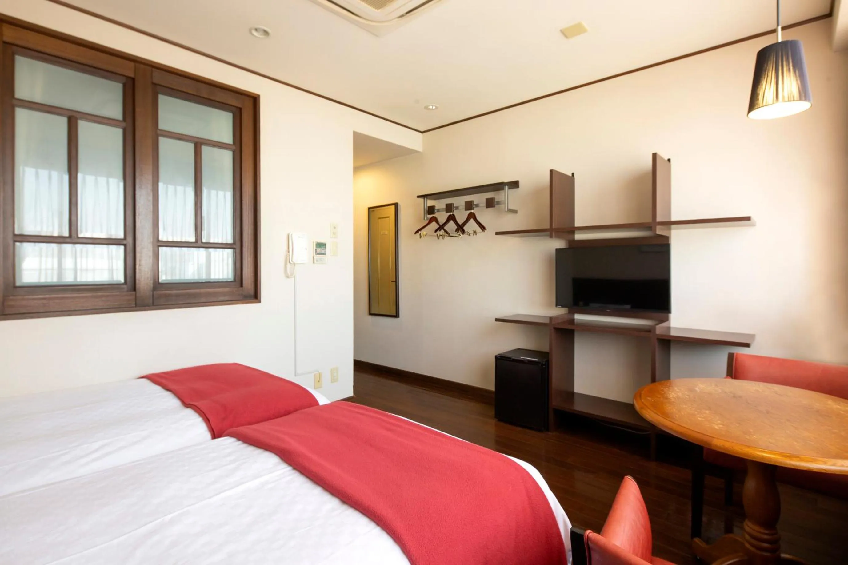 Photo of the whole room, Bed in Hotel Claire Higasa