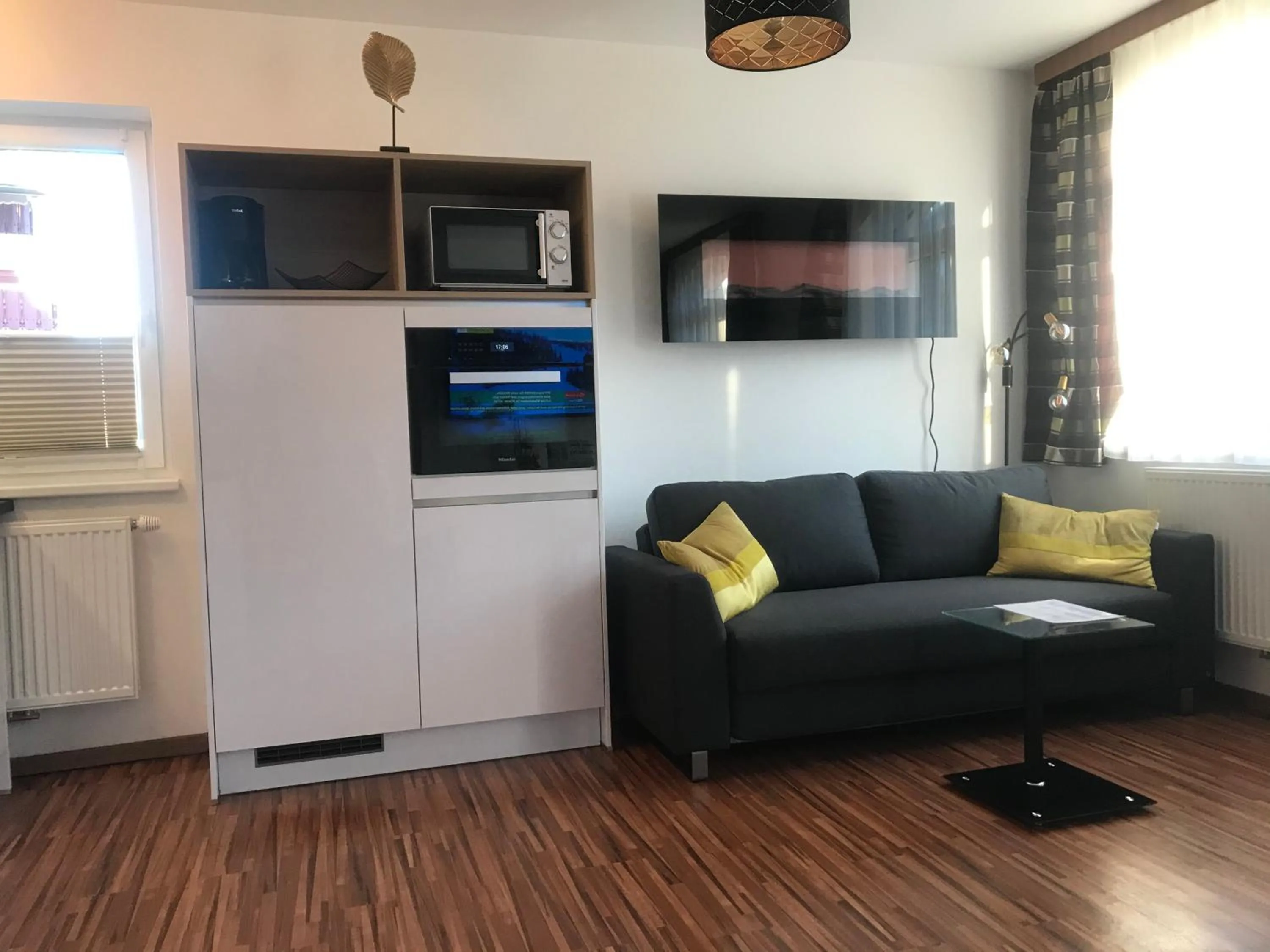 Communal lounge/ TV room in Hotel Erlebniswelt Stocker