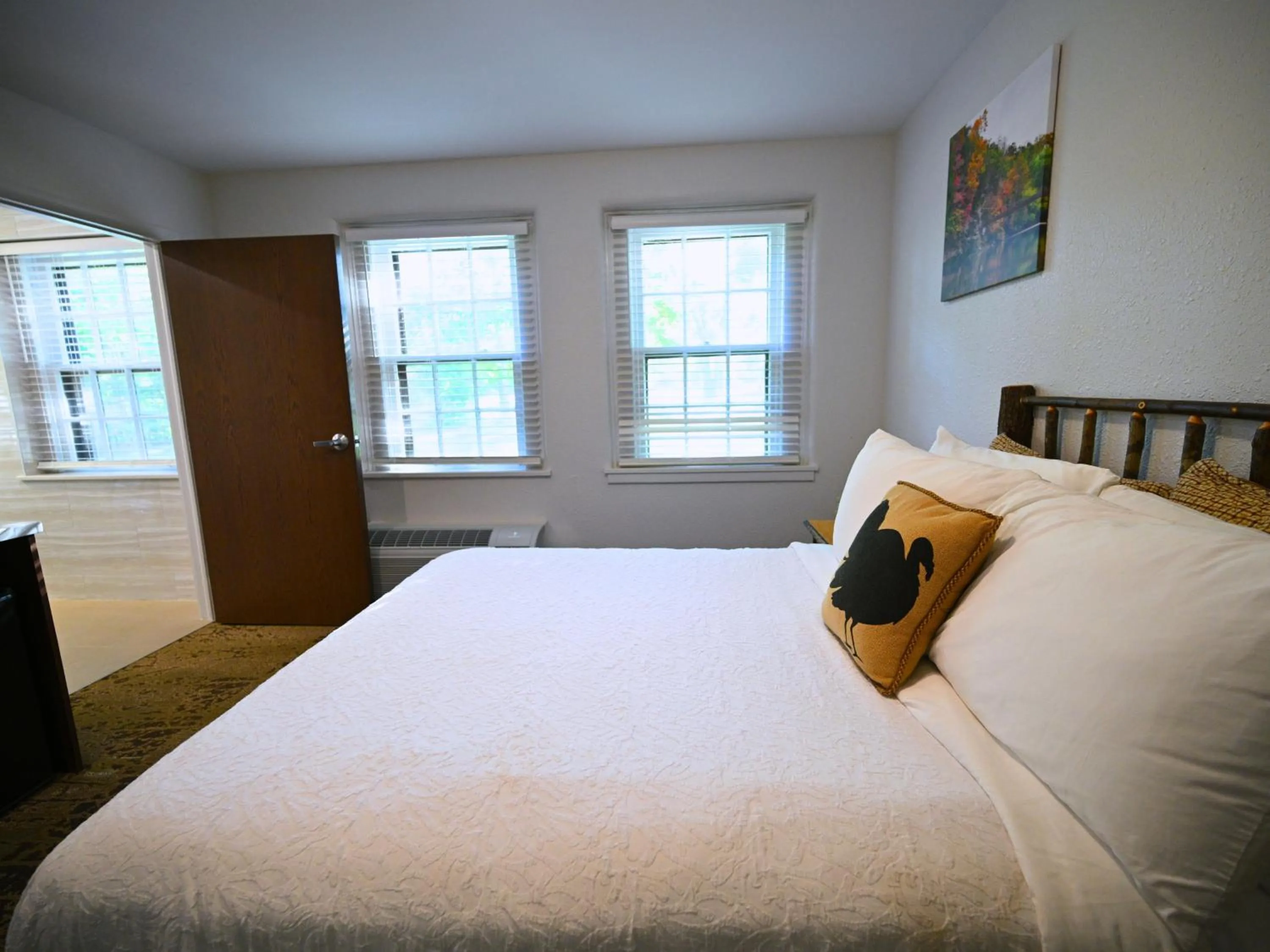 Bed in Turkey Run Inn & Cabins