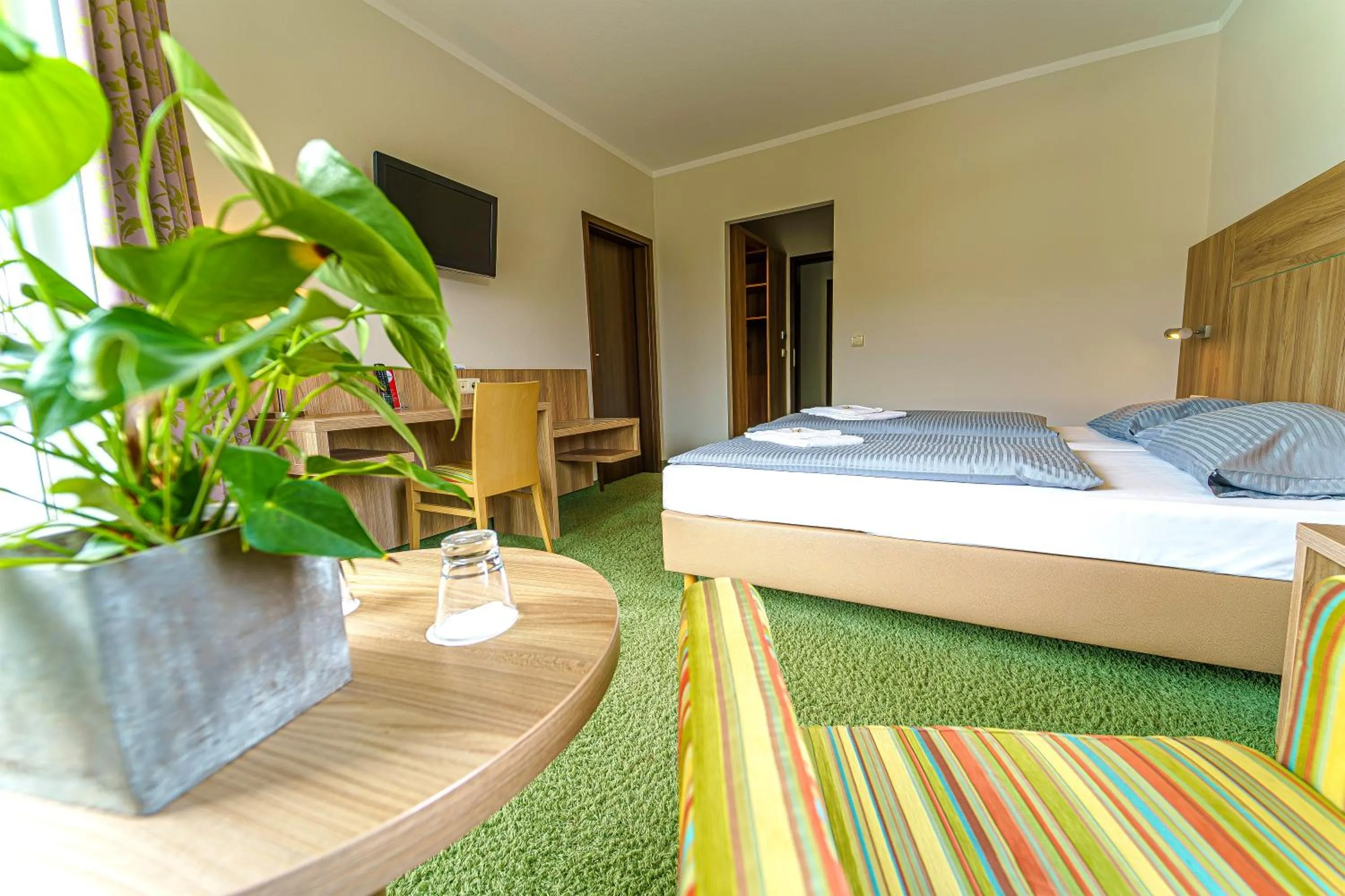 Bed in Einklang - Dein Hotel am Südhorn