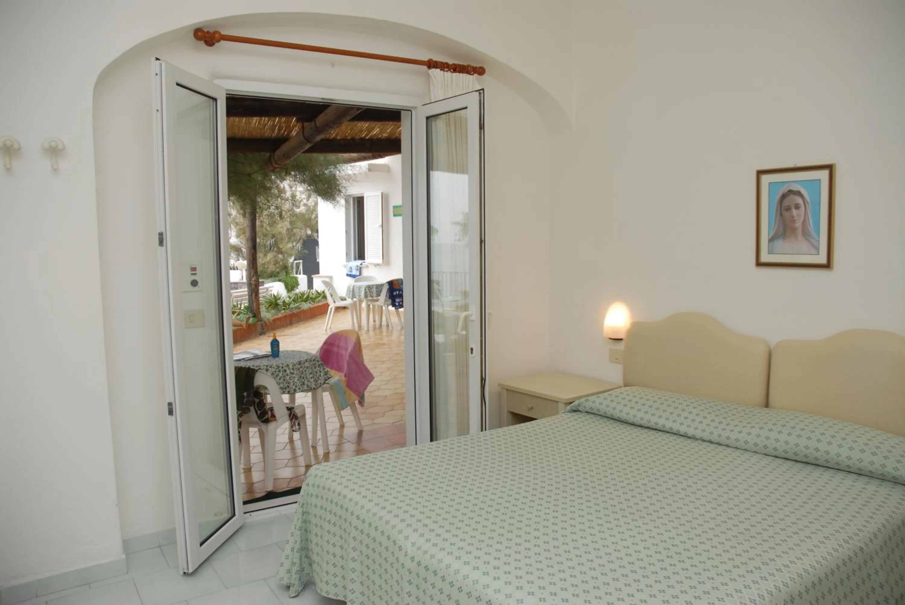 Photo of the whole room, Bed in La Citarea