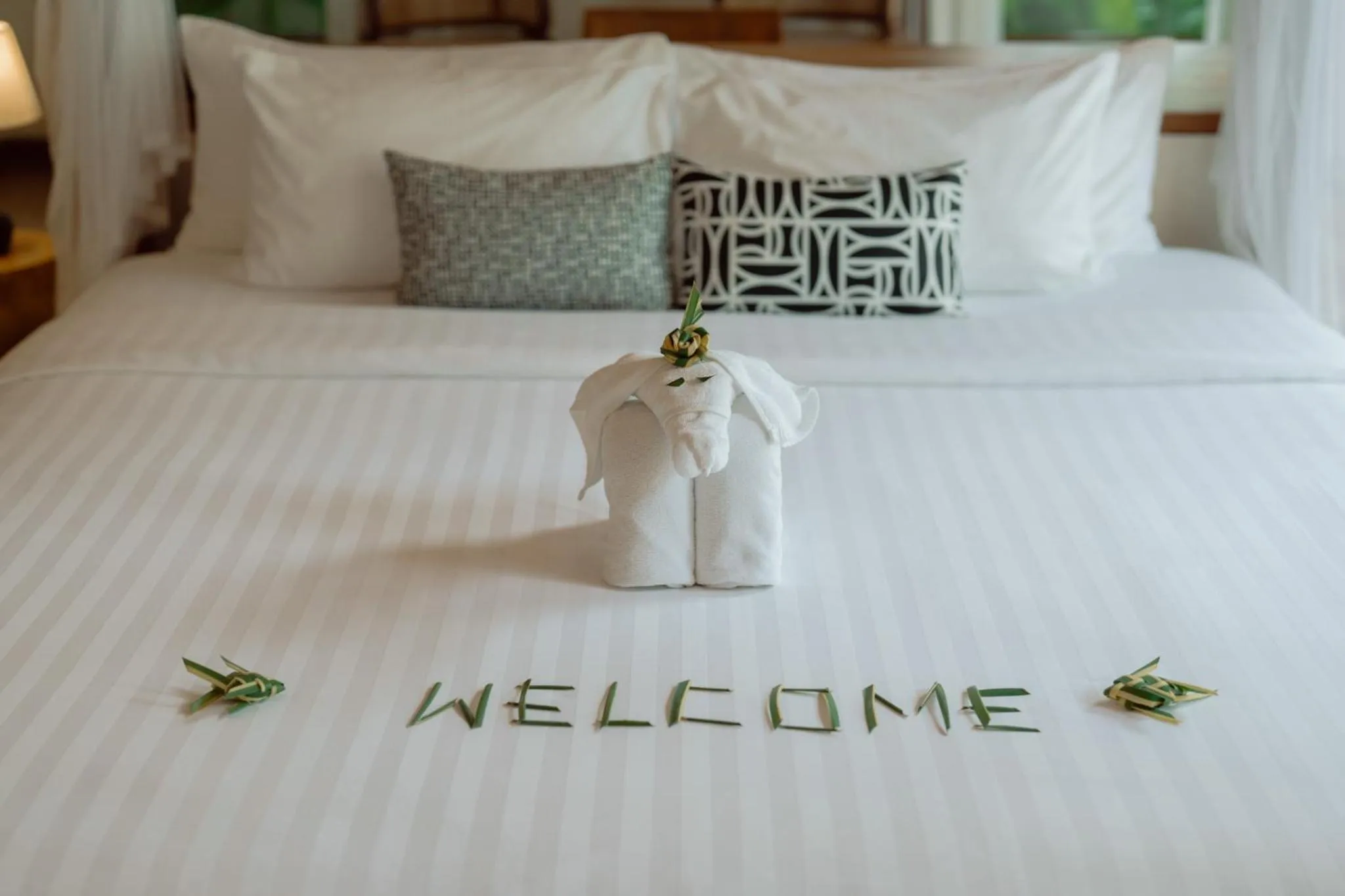 Bed in Metadee Concept Hotel