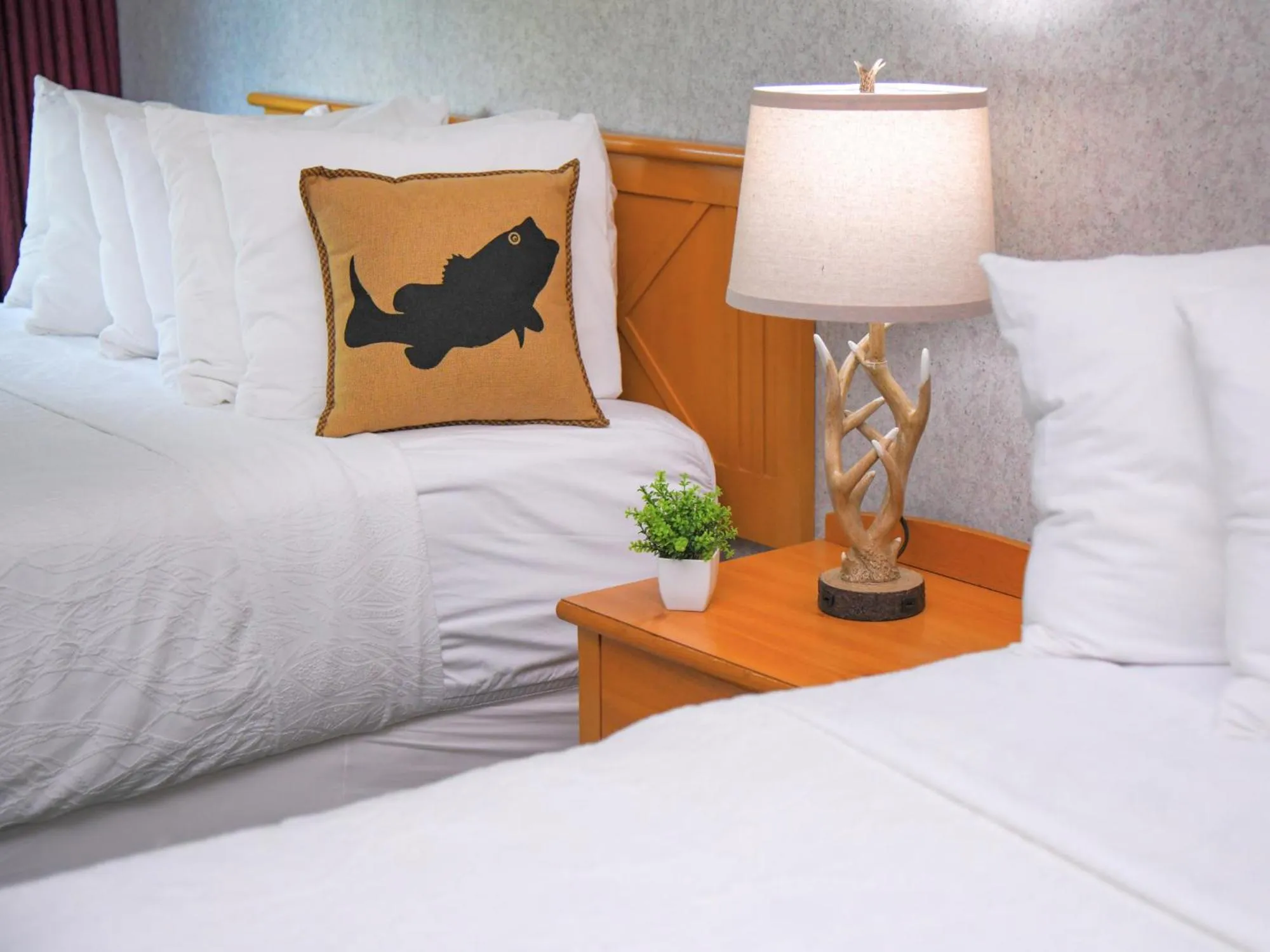 Bed in Potawatomi Inn & Cabins