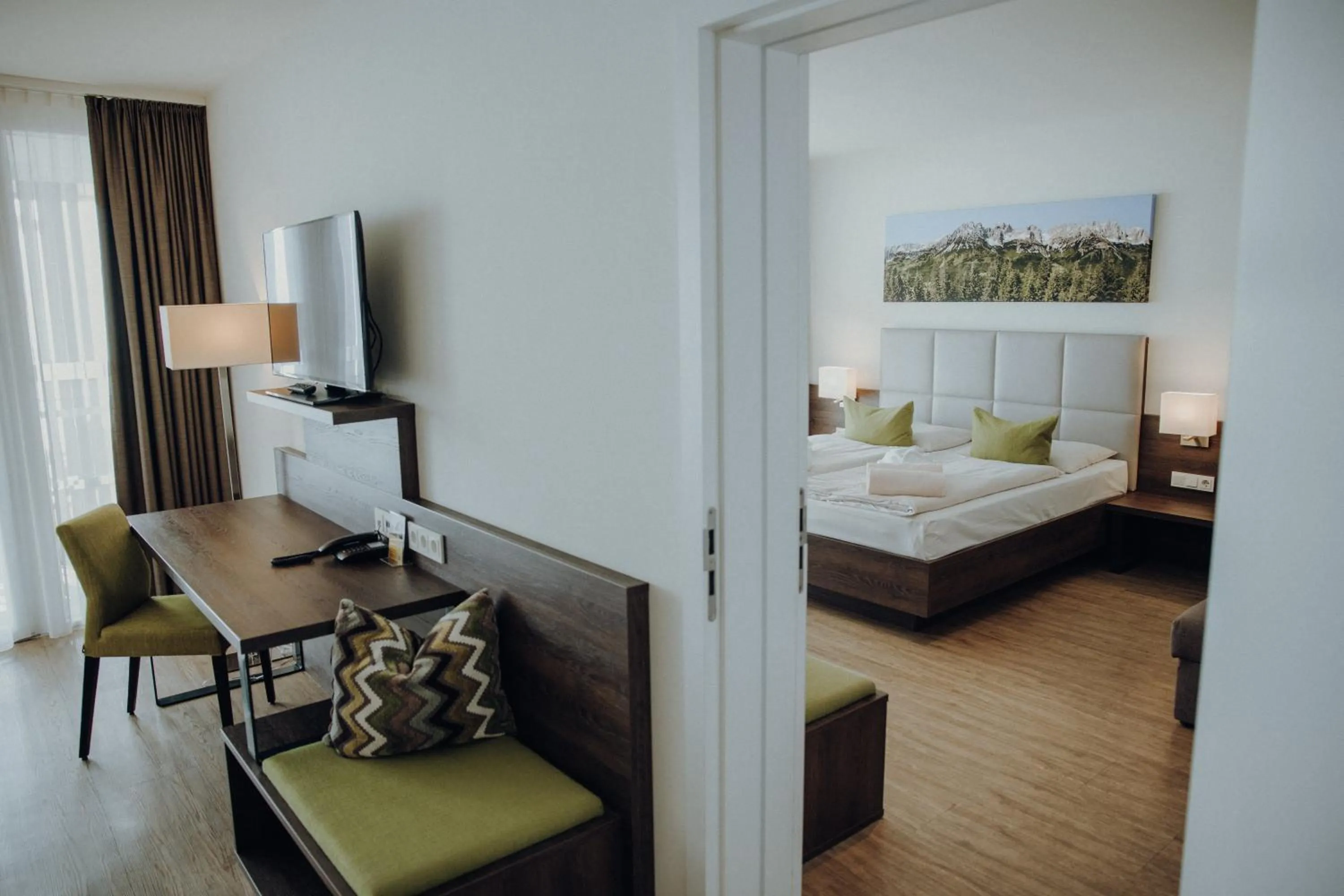 Photo of the whole room, Bed in Alpenhotel Kaiserfels