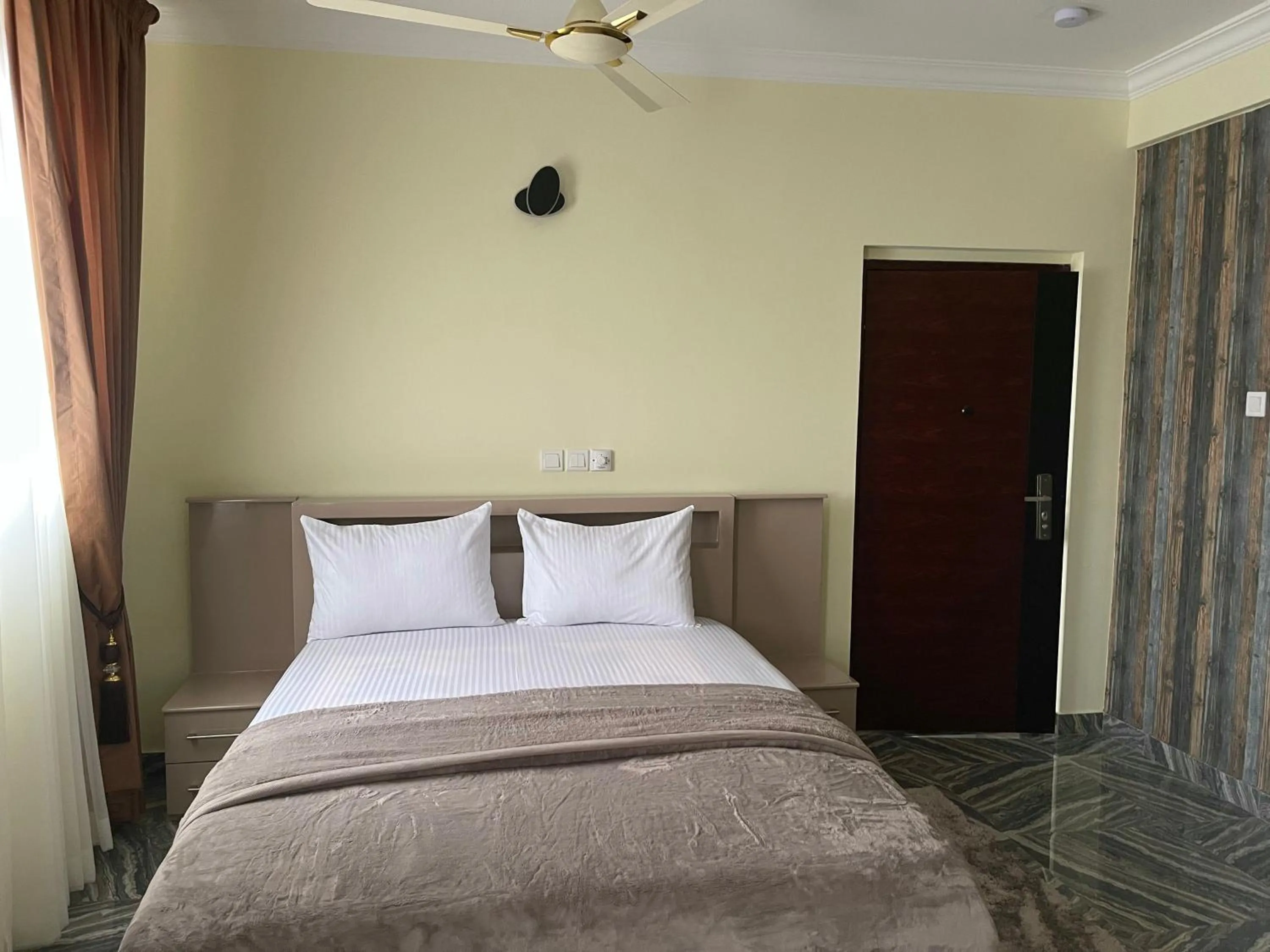 Bed in Exotic Palace Hotel