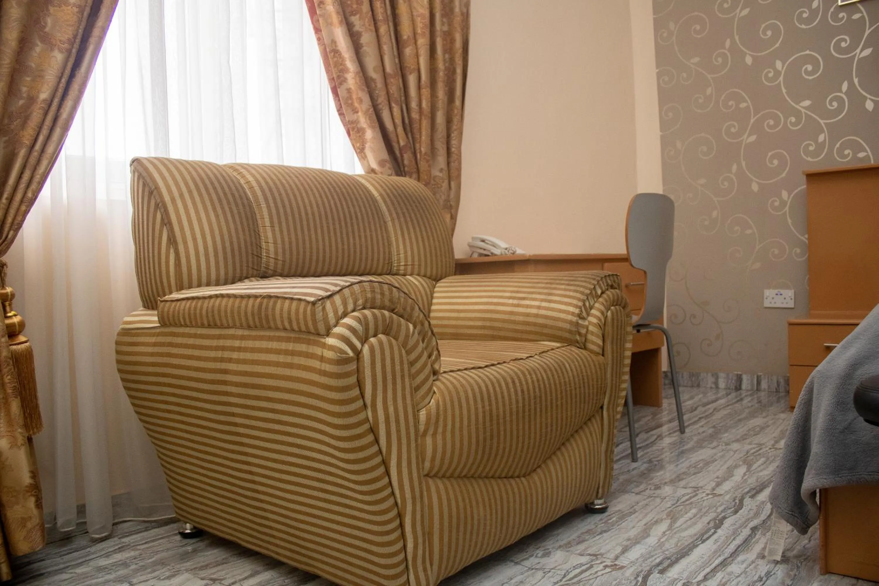 Seating area in Exotic Palace Hotel