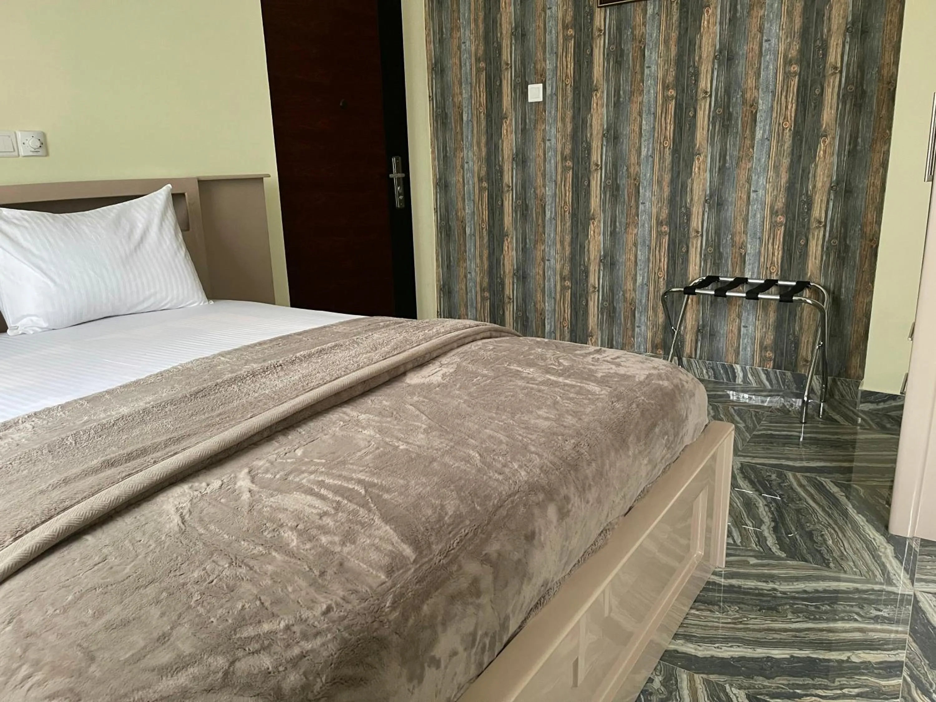 Bed in Exotic Palace Hotel