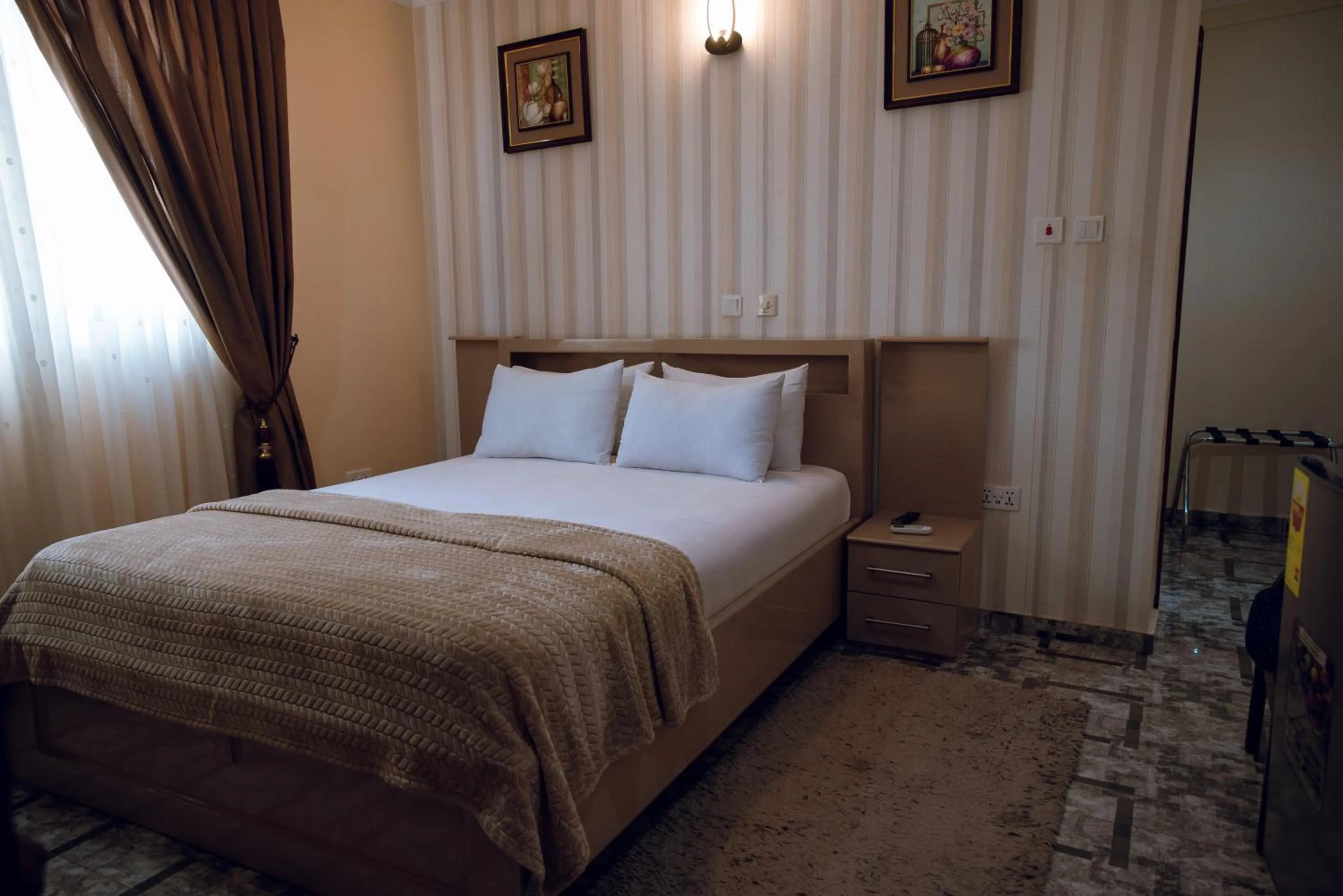 Bed in Exotic Palace Hotel