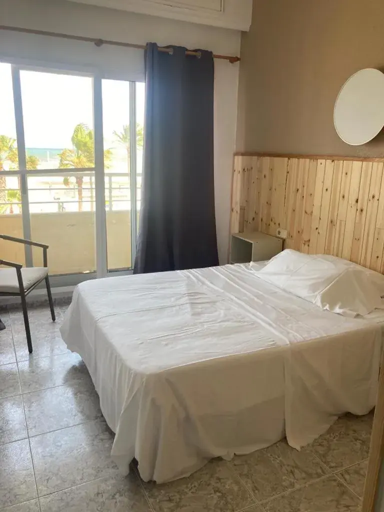 Bed in Malvarrosa Beach Rooms Bed in Malvarrosa Beach Rooms