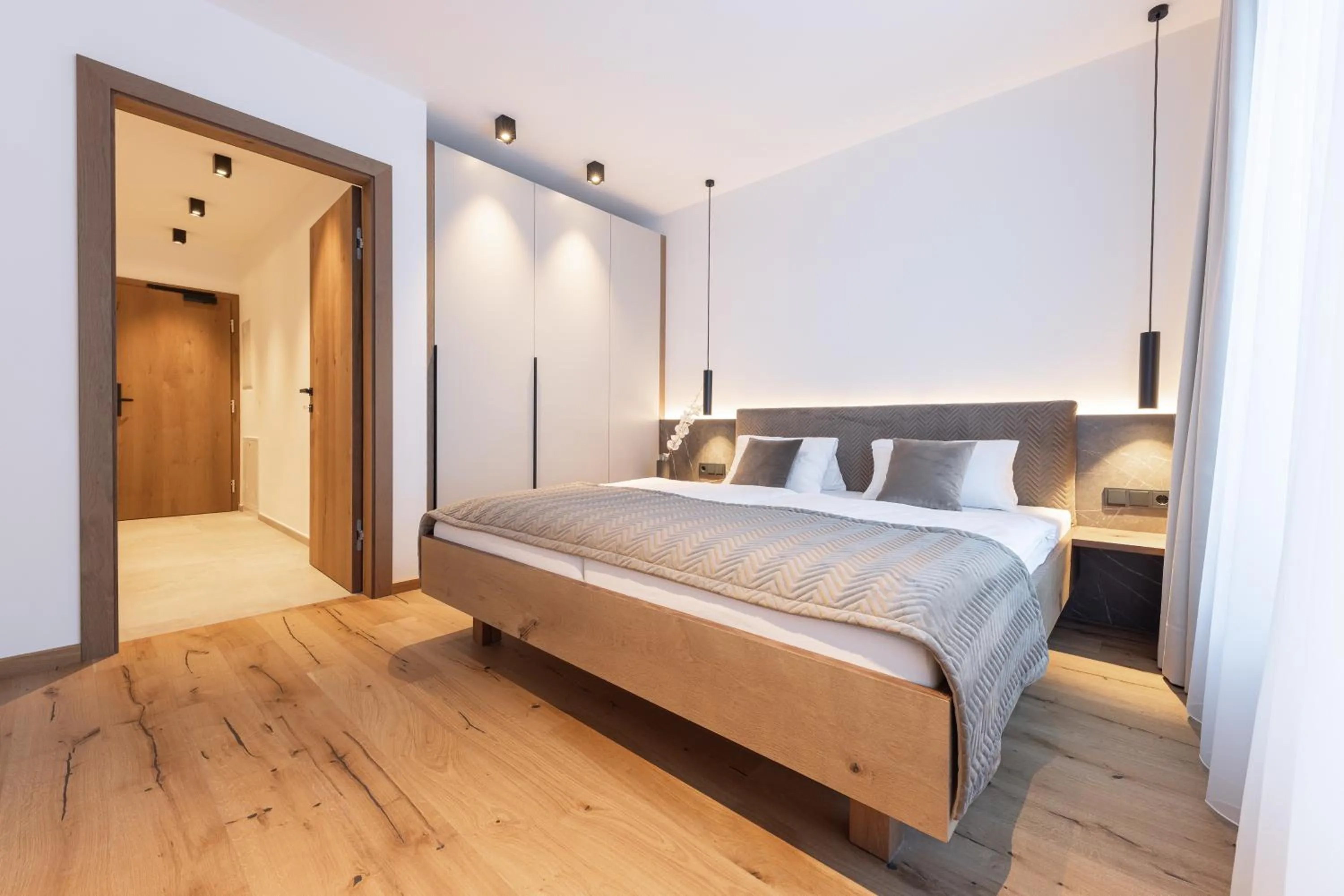 Bed in Max Mountain Apartments