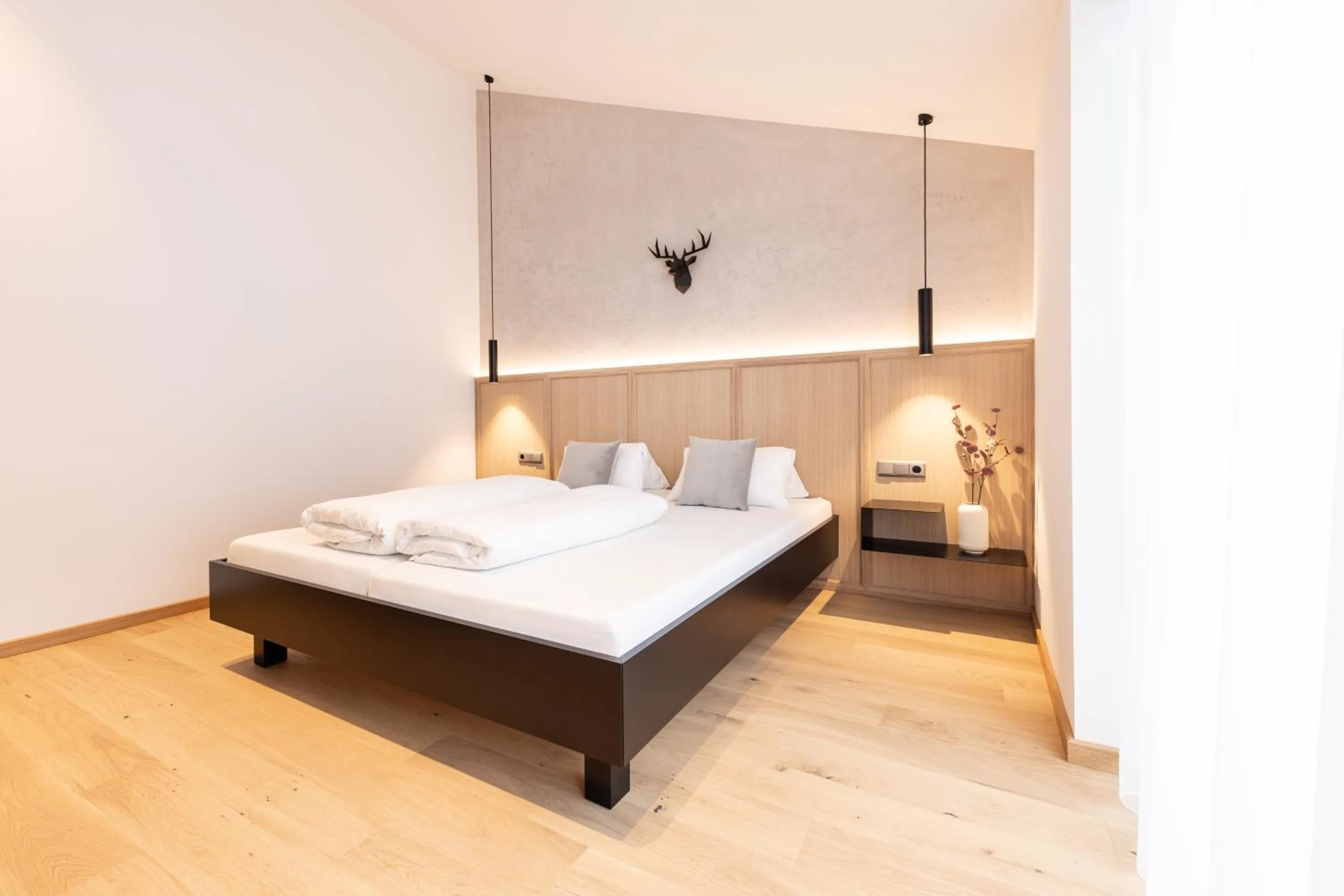 Bed in Max Mountain Apartments