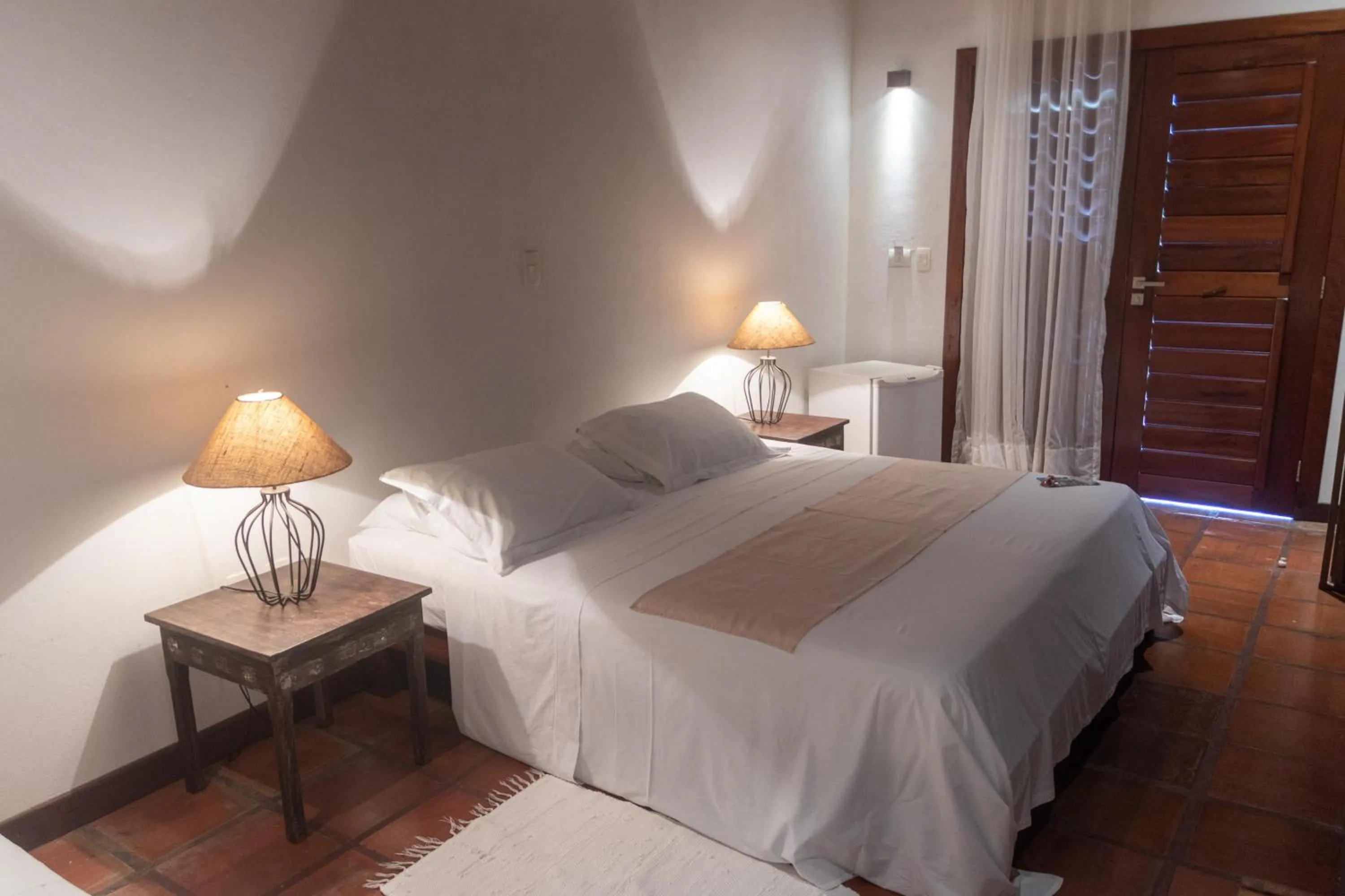 Bed in Hotel Villaggio Tudo Bom