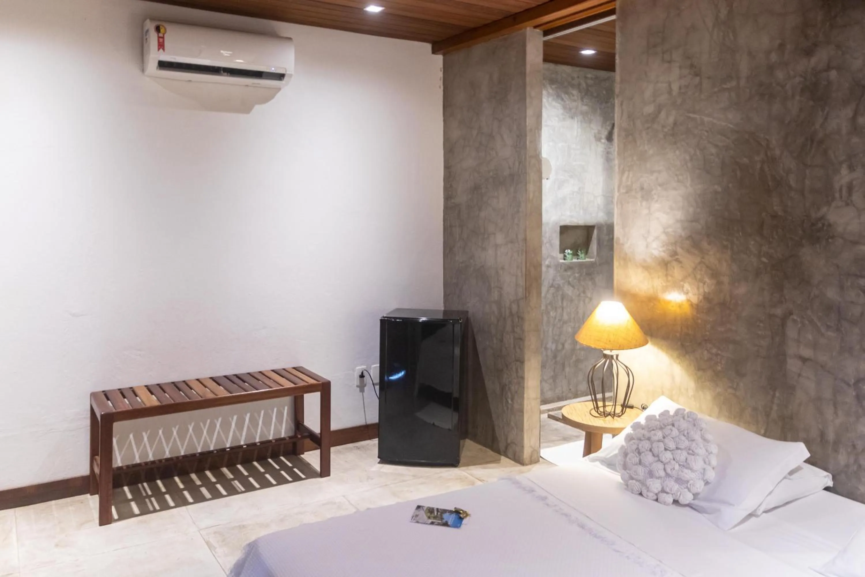 Bed in Hotel Villaggio Tudo Bom