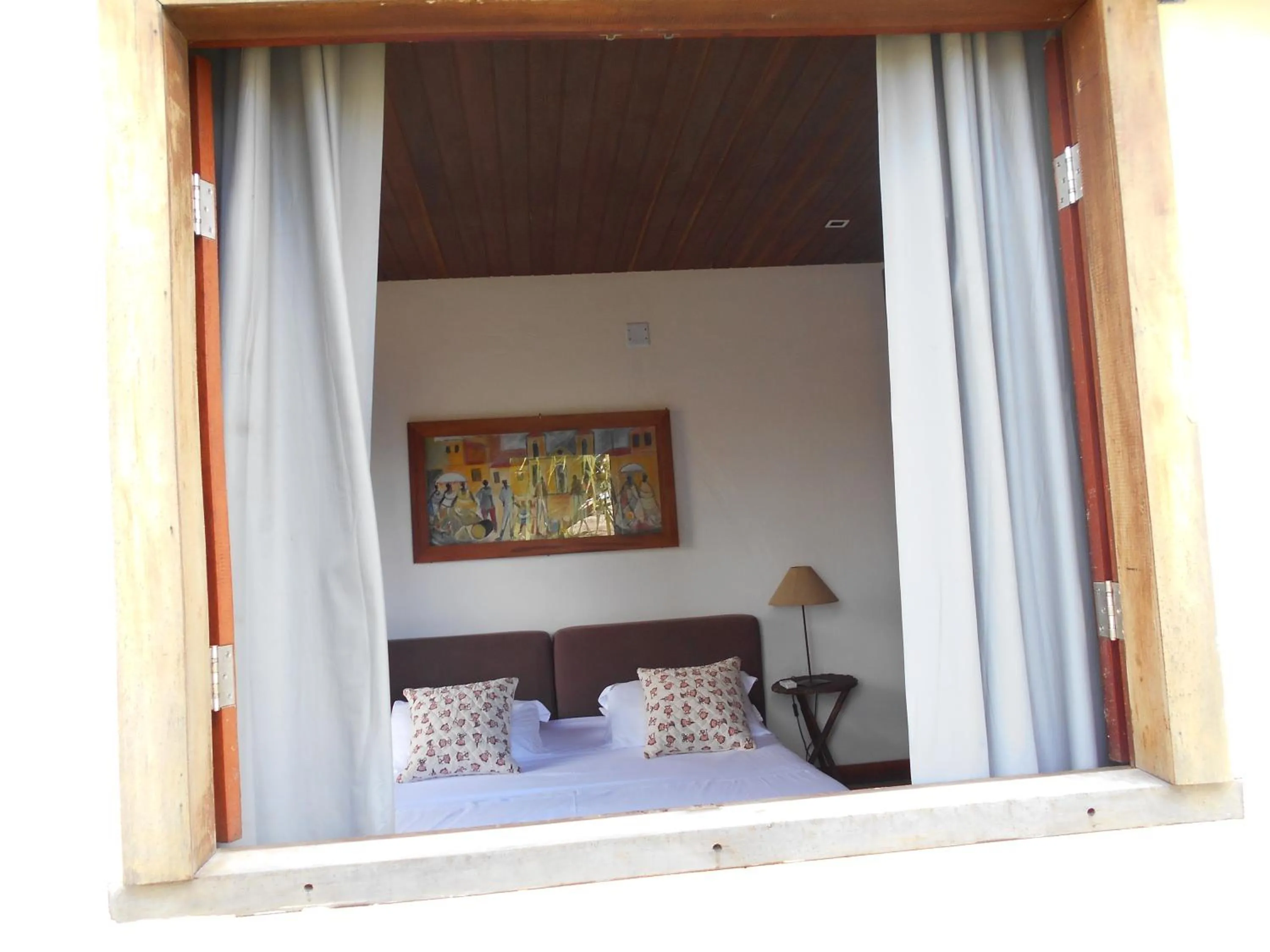 Bed in Hotel Villaggio Tudo Bom