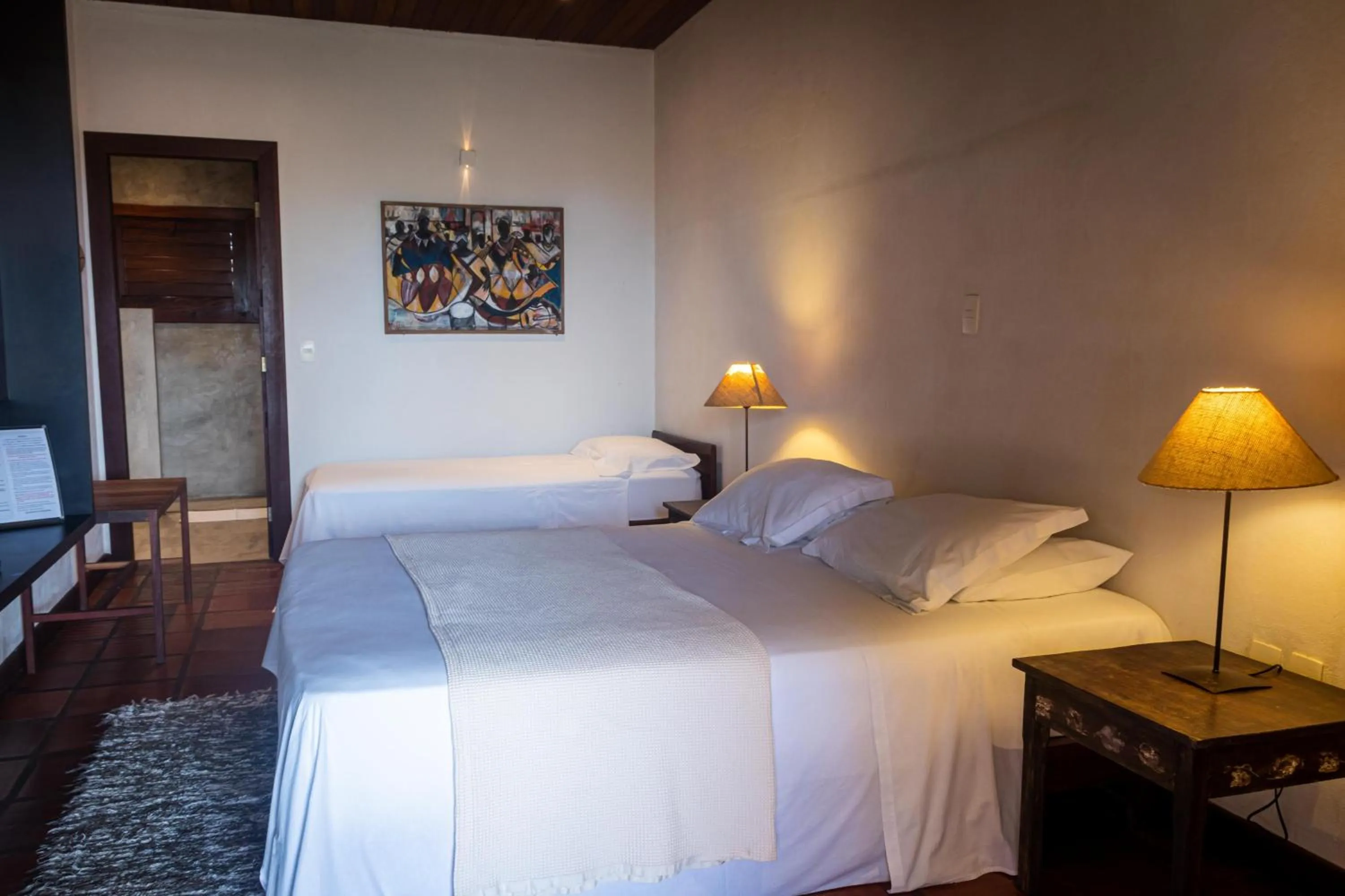 Bed in Hotel Villaggio Tudo Bom