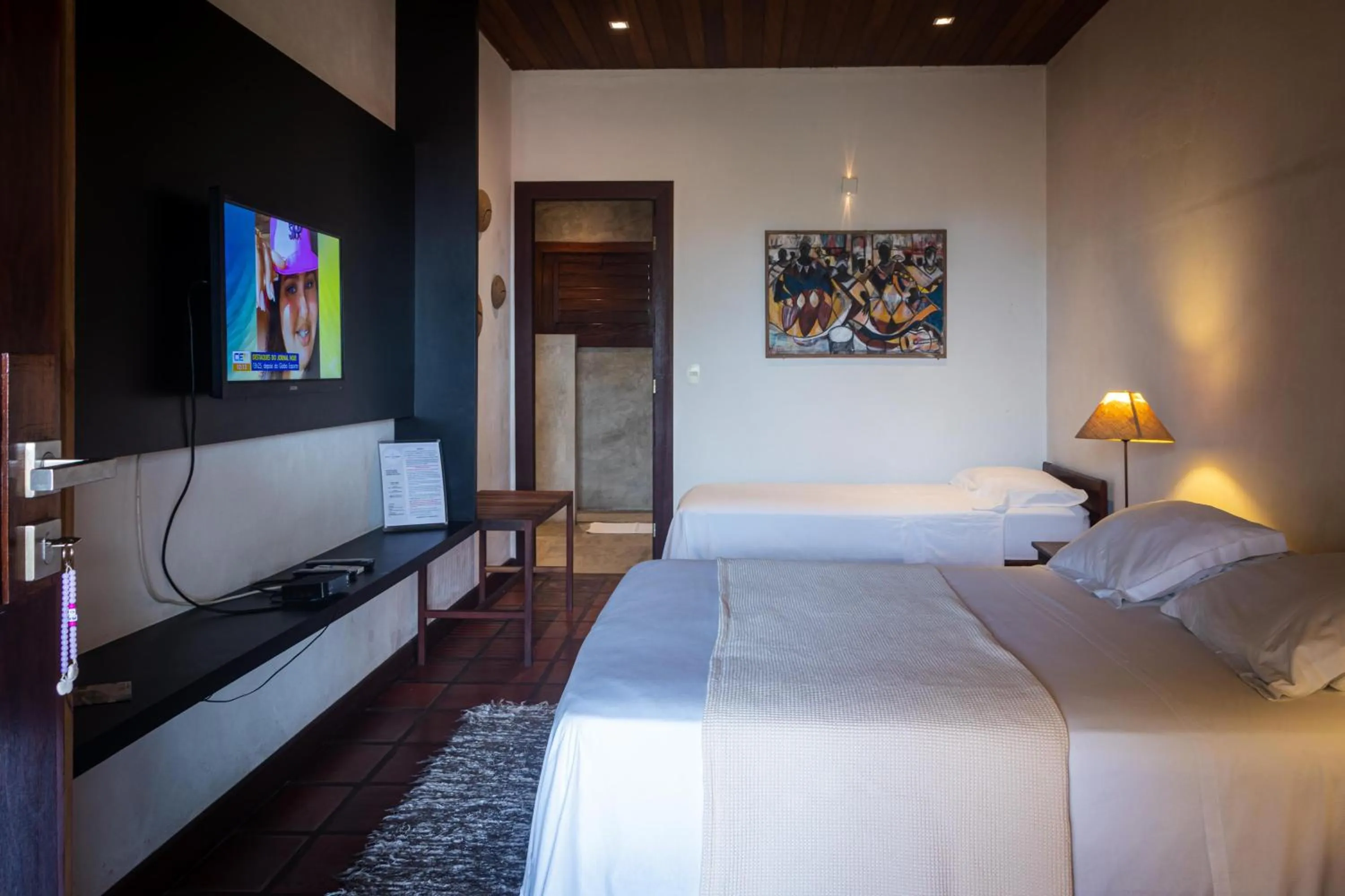 Bed in Hotel Villaggio Tudo Bom