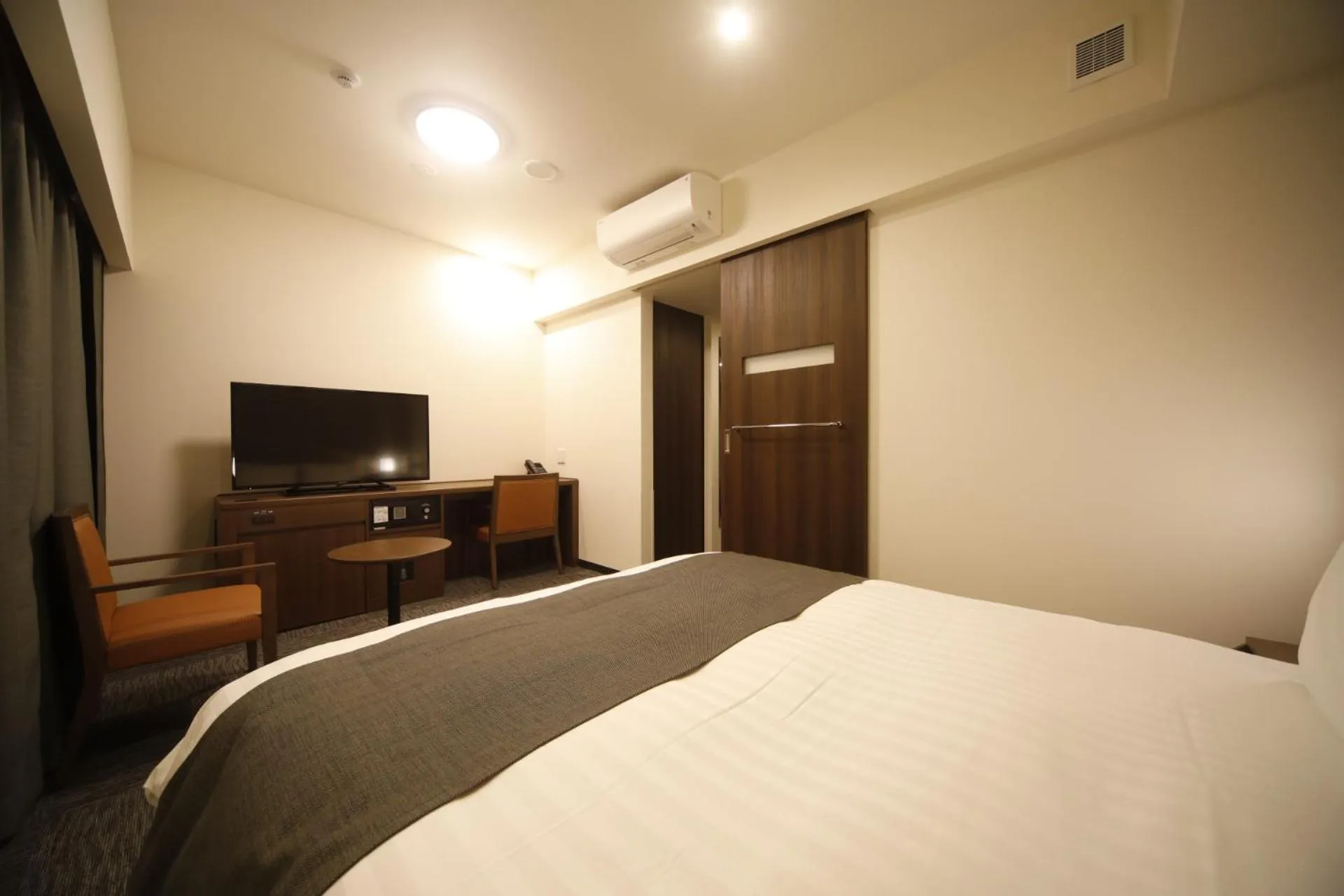 Photo of the whole room, Bed in Dormy Inn Oita