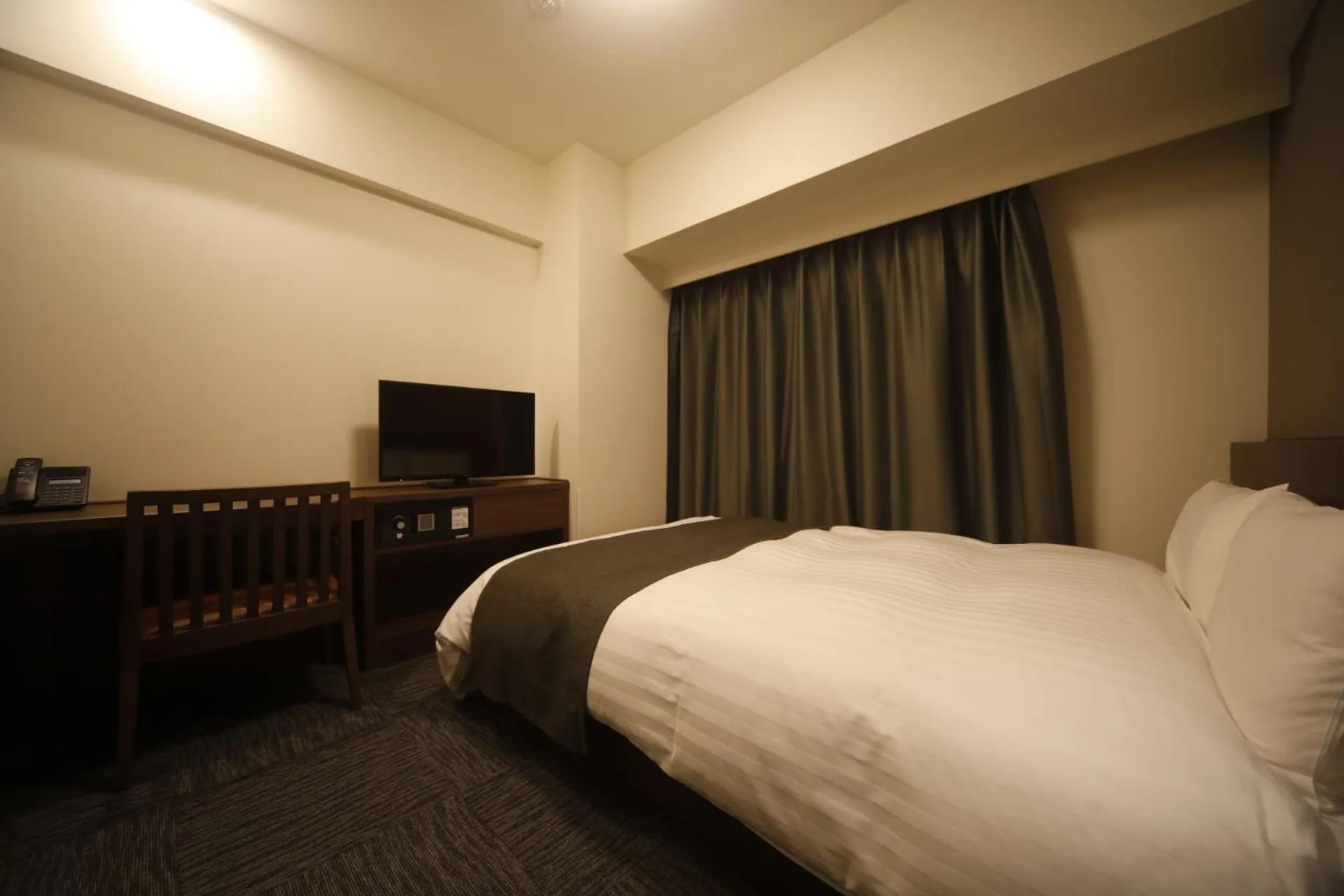 Photo of the whole room, Bed in Dormy Inn Oita