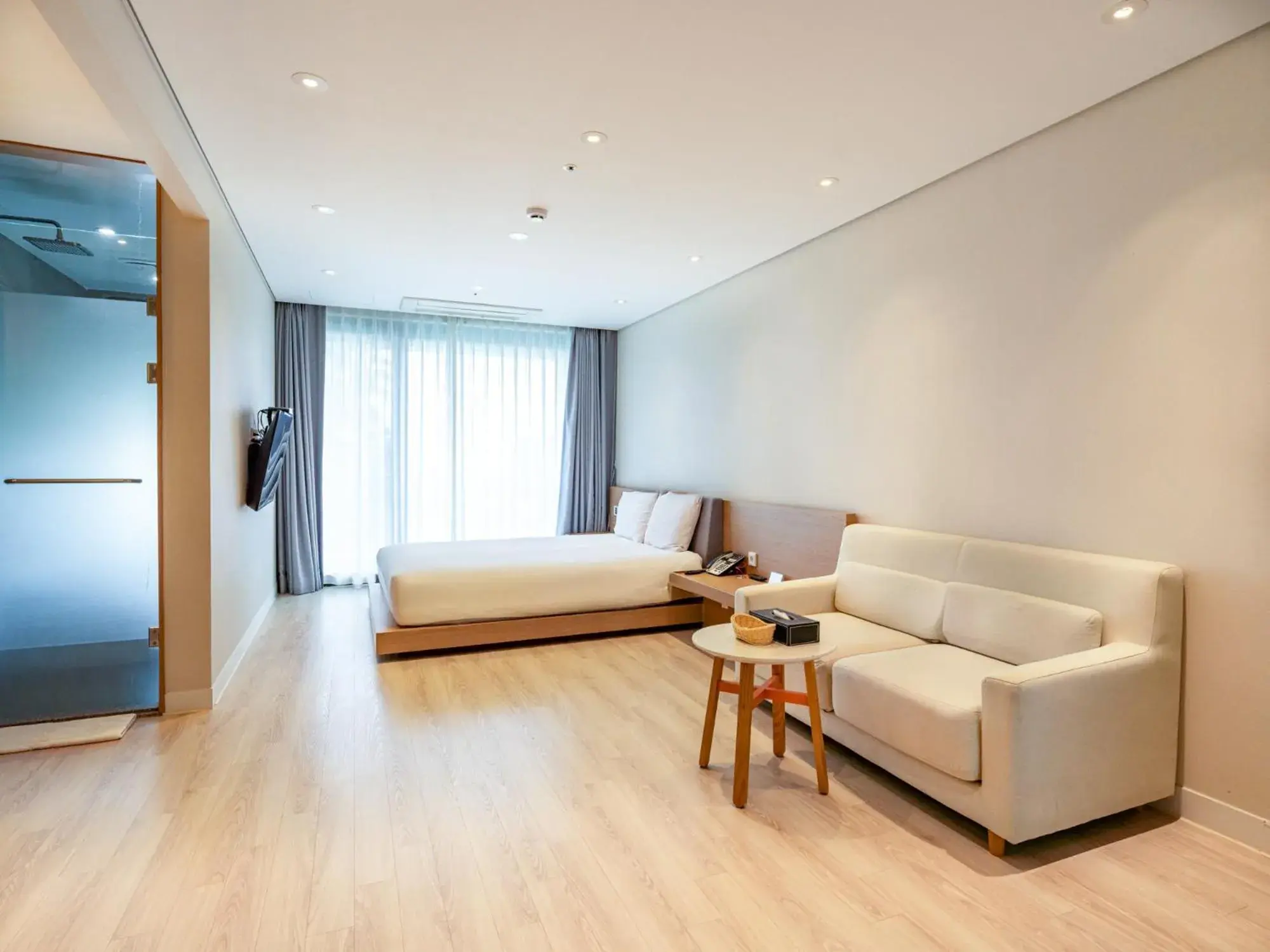 Living room in Jeju Attirance Hotel & poolvilla Living room in Jeju Attirance Hotel & poolvilla