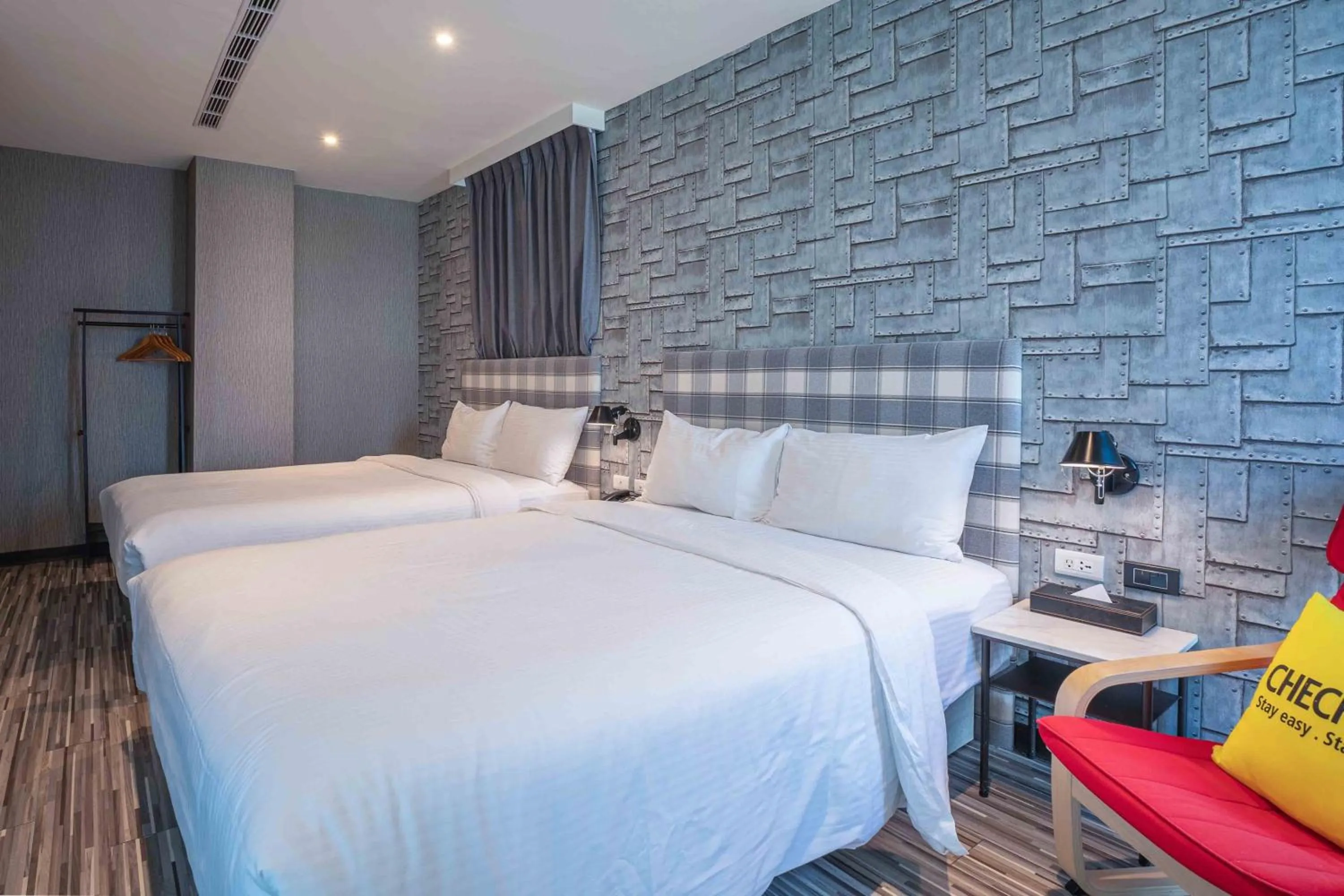 Bed in CHECK inn Taichung Ziyou