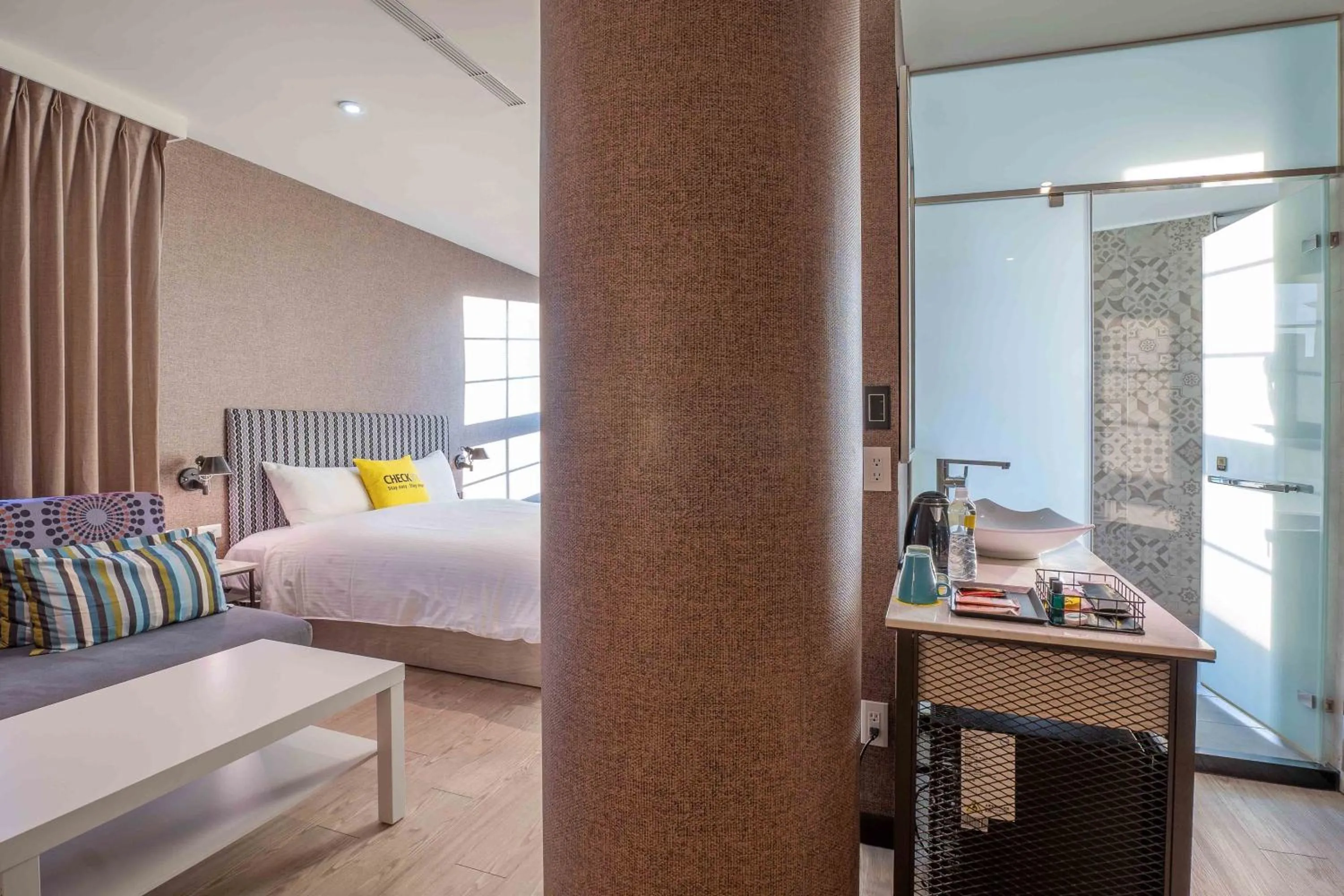 Bed in CHECK inn Taichung Ziyou