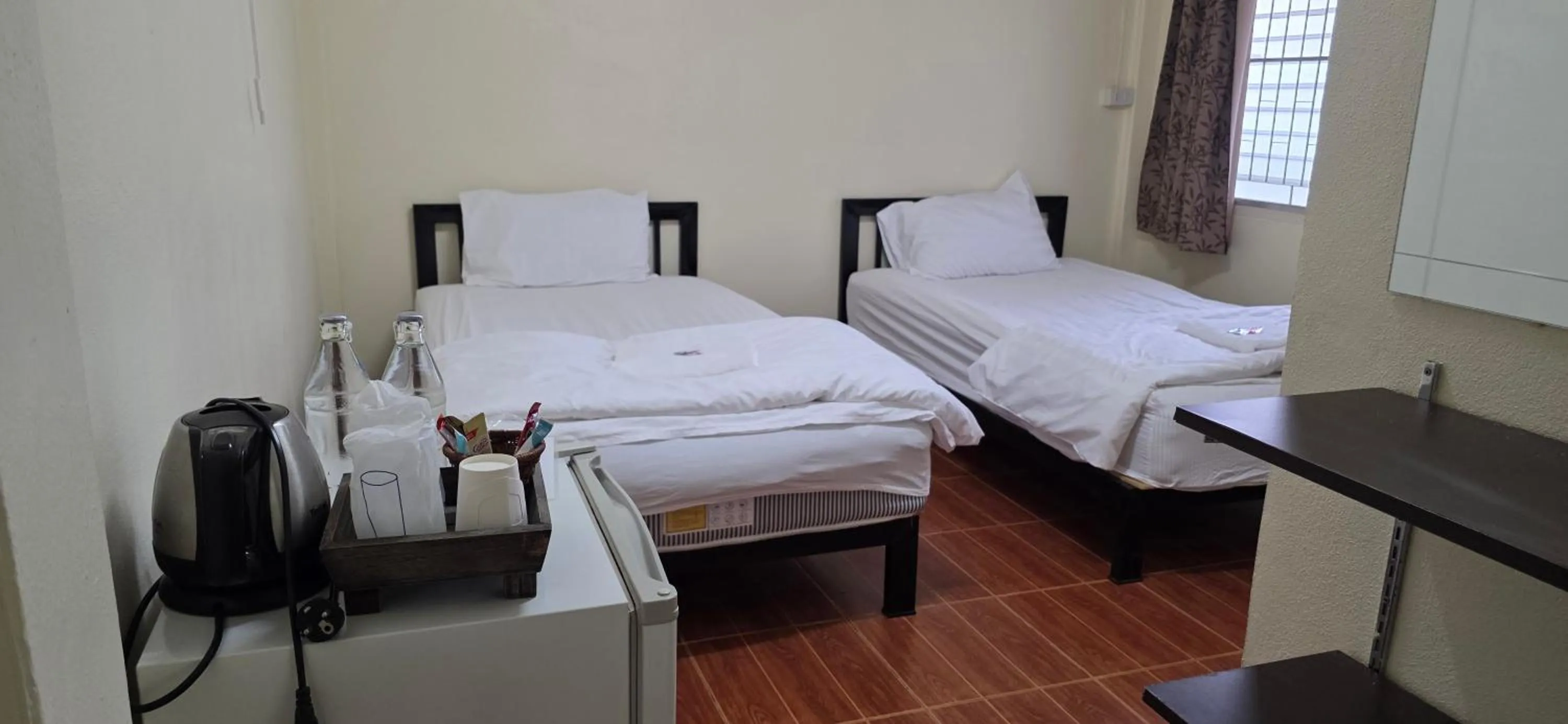 Photo of the whole room, Bed in P.L.P Guesthouse - Mae Hong Son