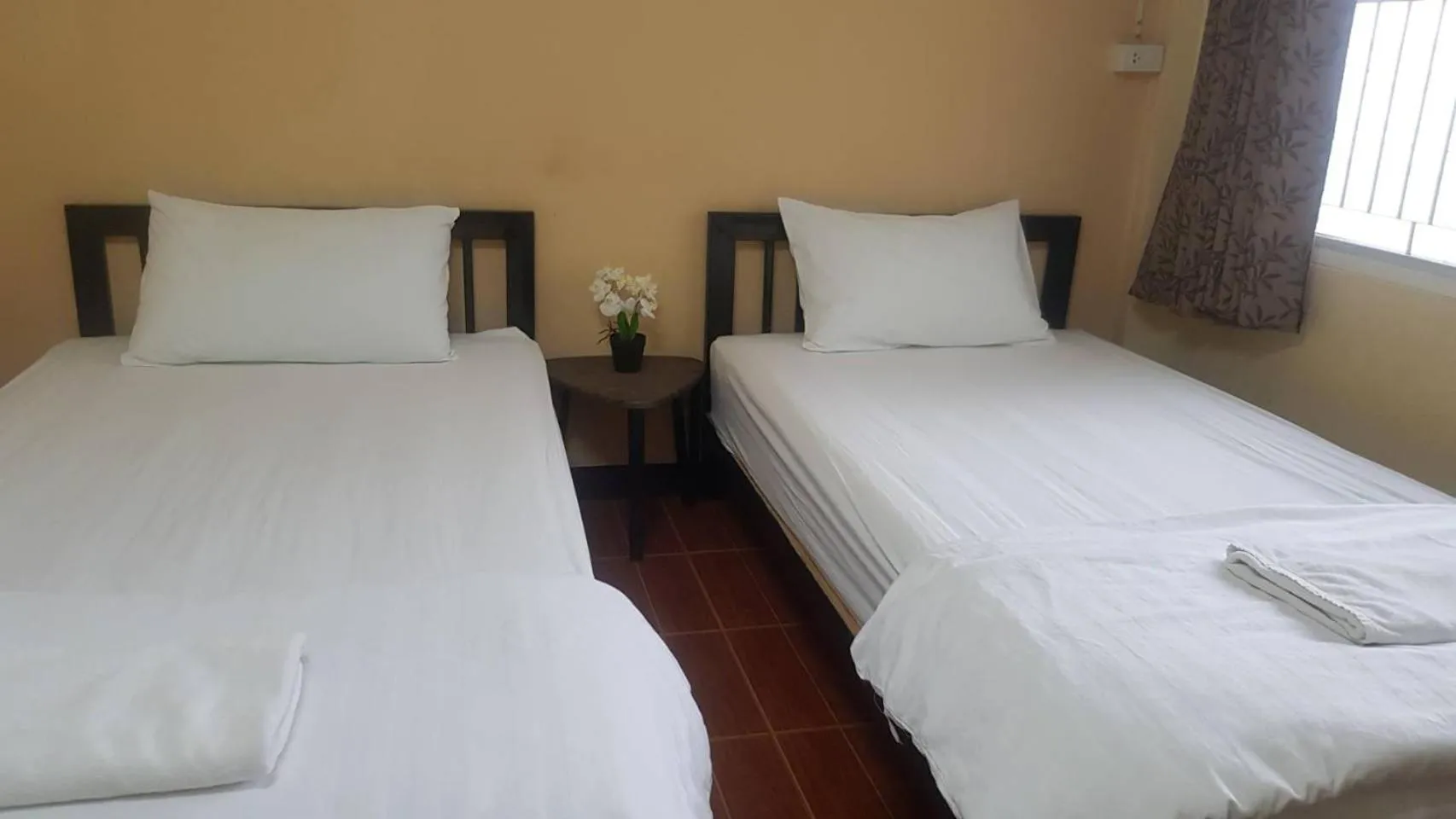 Photo of the whole room, Bed in P.L.P Guesthouse - Mae Hong Son