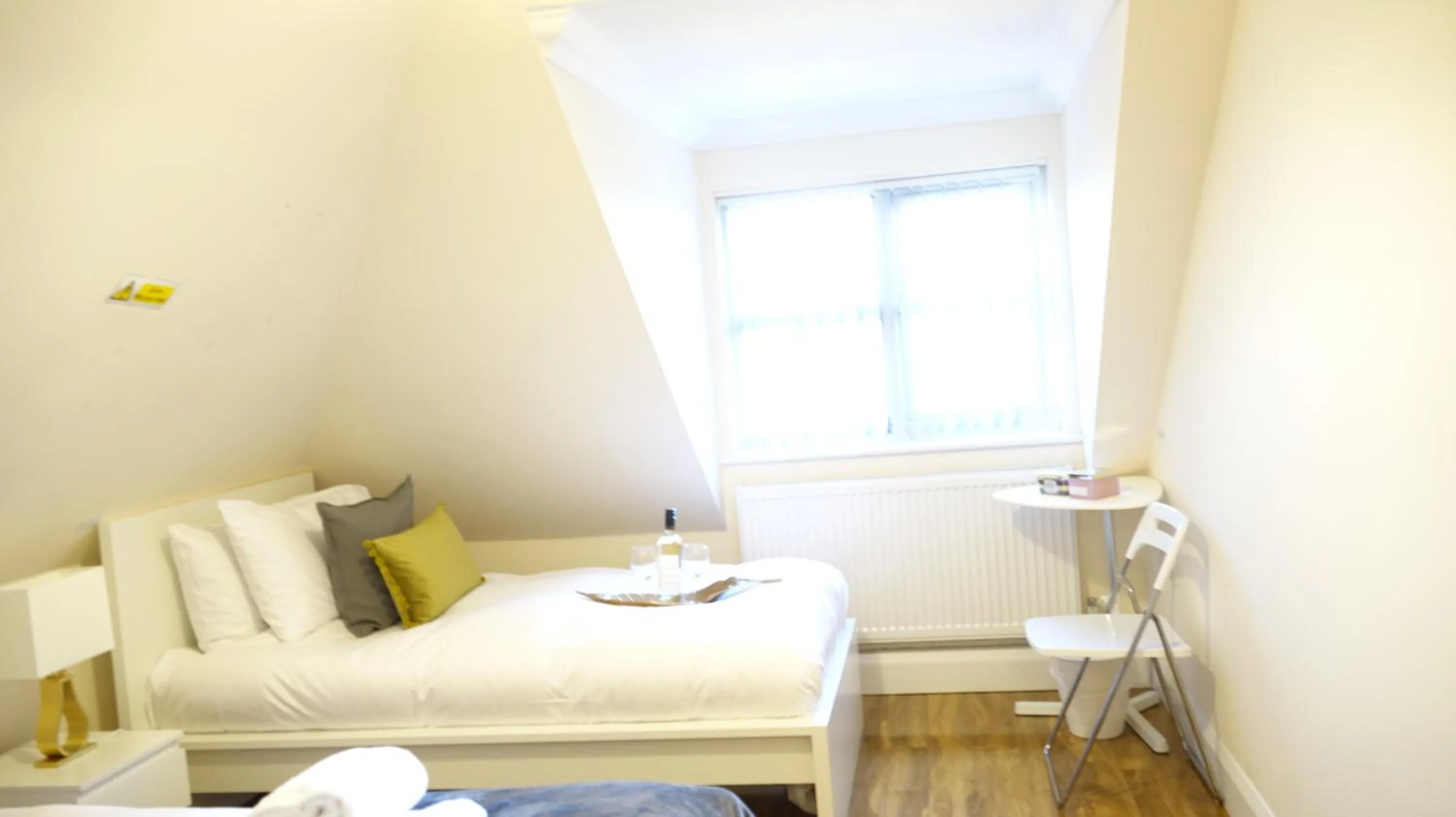 Bedroom in RC Airport Rooms