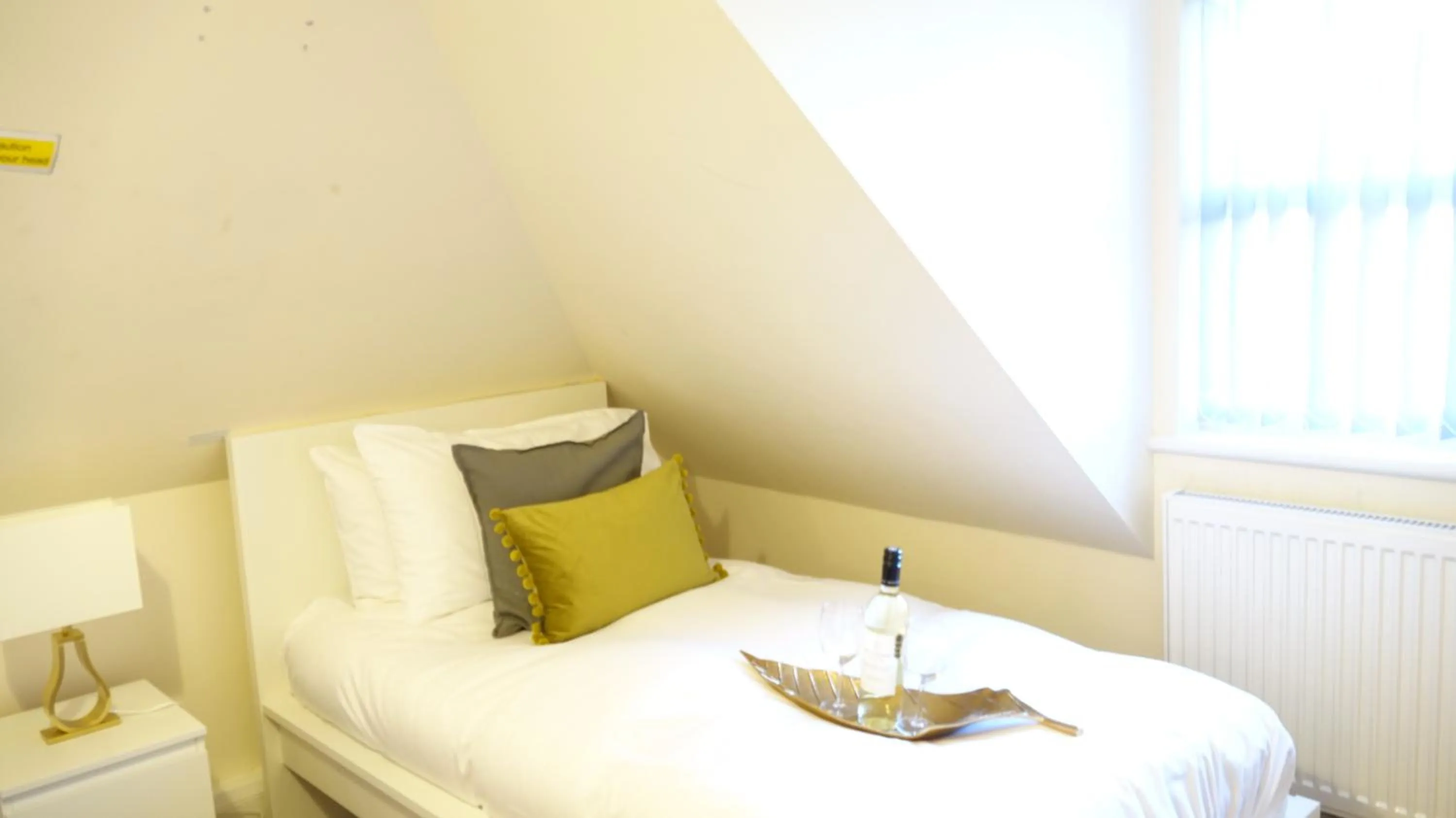 Bedroom in RC Airport Rooms