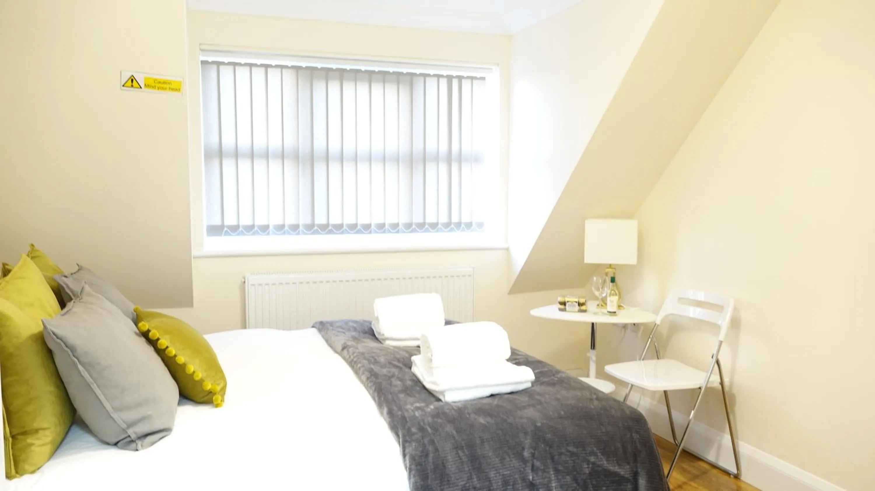 Bedroom in RC Airport Rooms