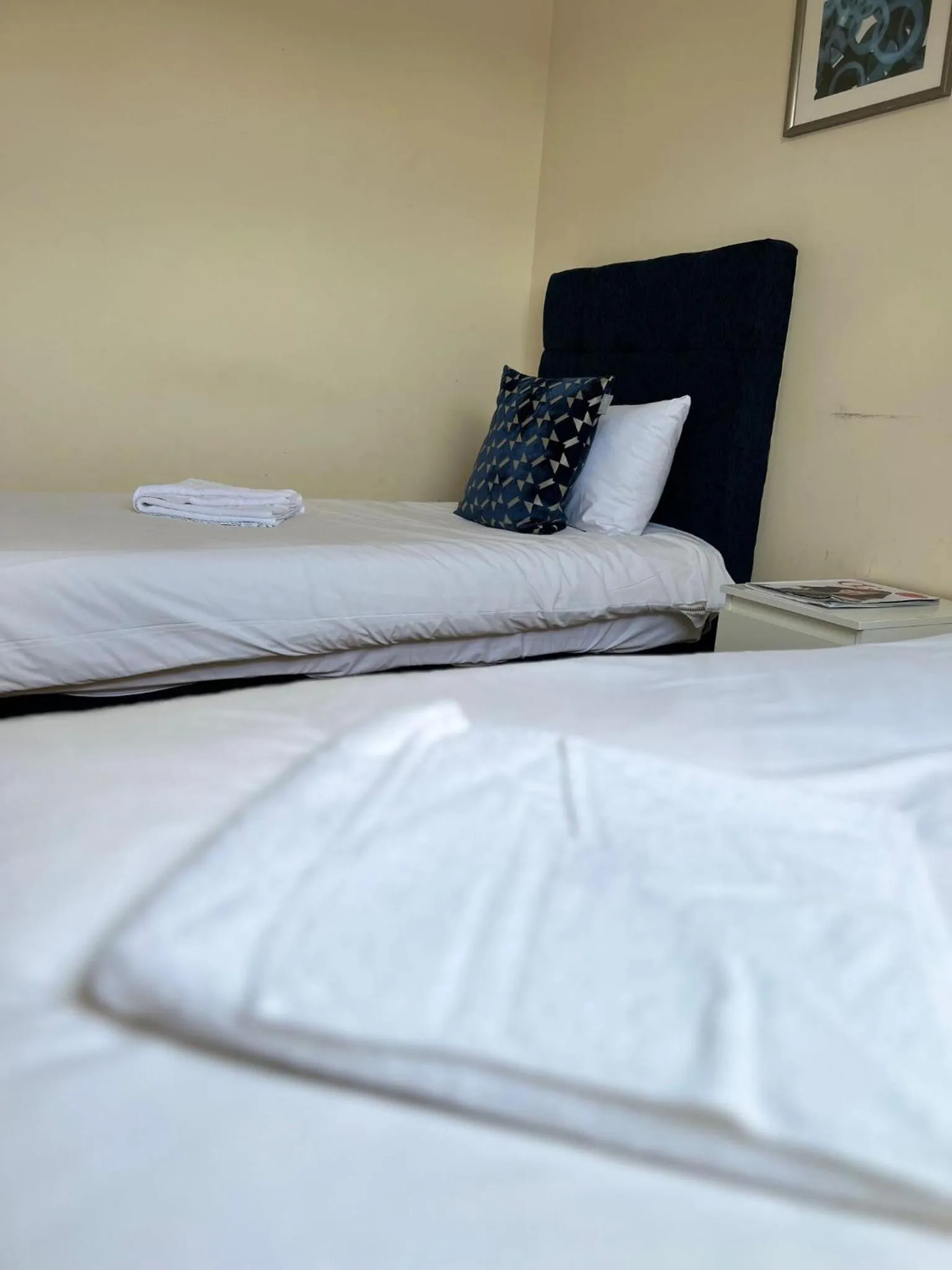 Bed in RC Airport Rooms