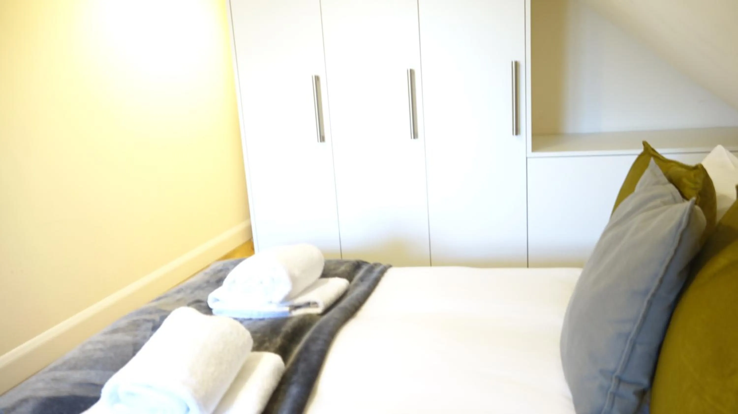 Bedroom in RC Airport Rooms