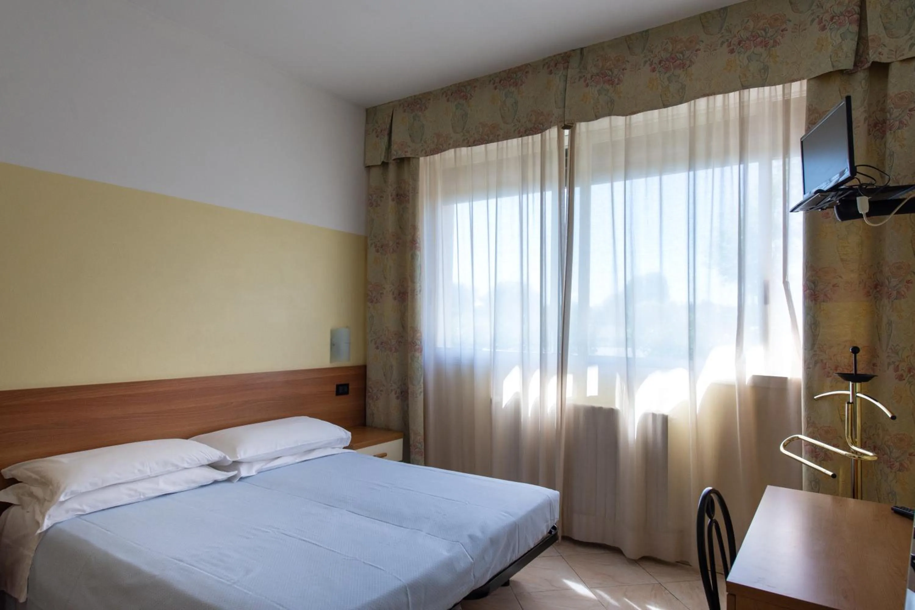 Bed in Hotel Fattori
