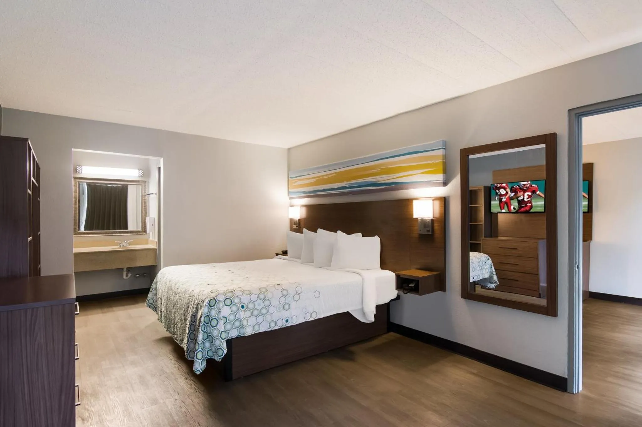 Photo of the whole room, Bed in HomeTowne Studios by Red Roof Vero Beach - I-95