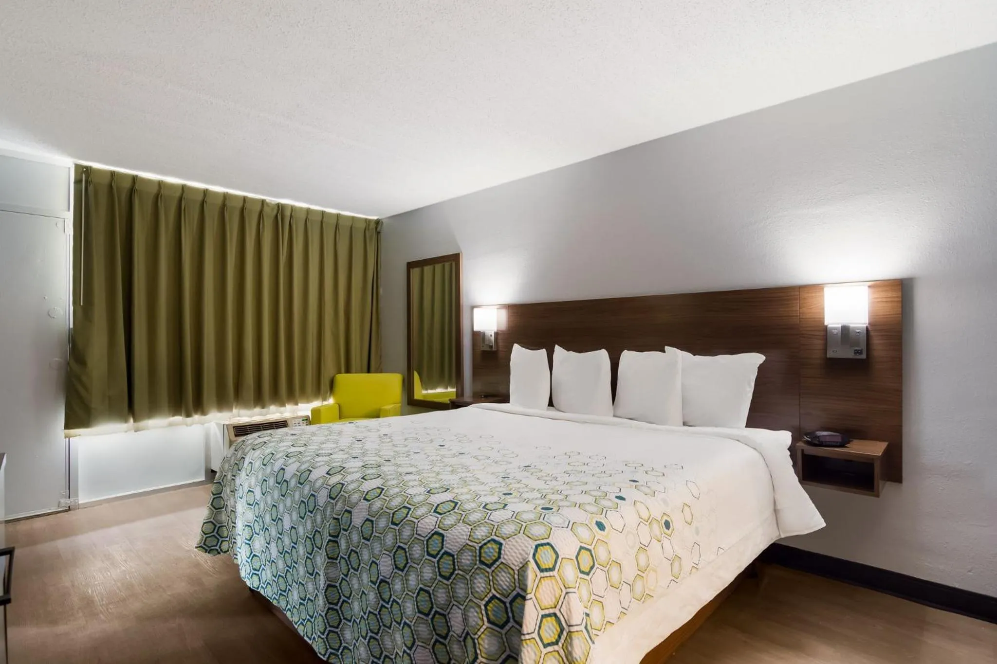 Bedroom, Bed in HomeTowne Studios by Red Roof Vero Beach - I-95