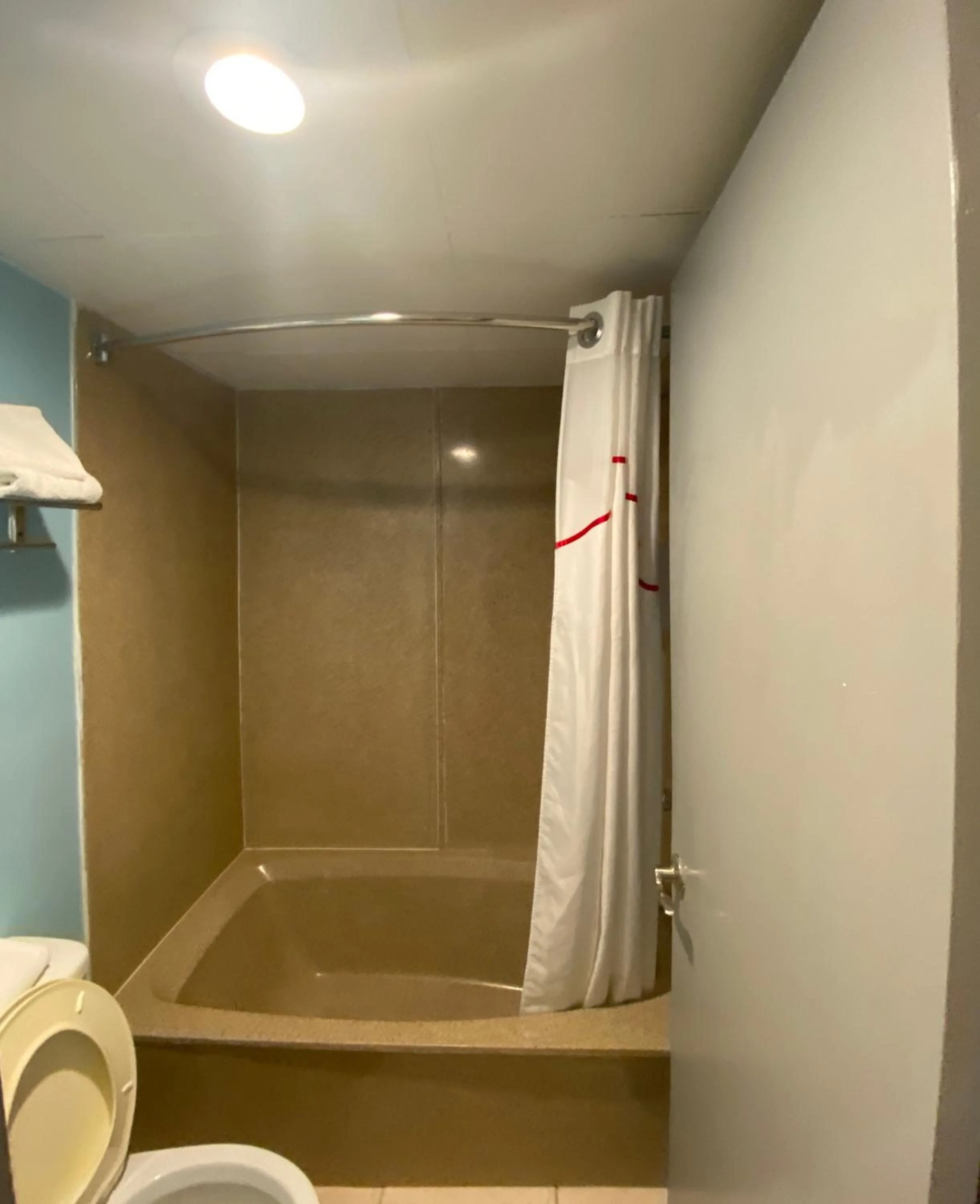 Bathroom in HomeTowne Studios by Red Roof Vero Beach - I-95