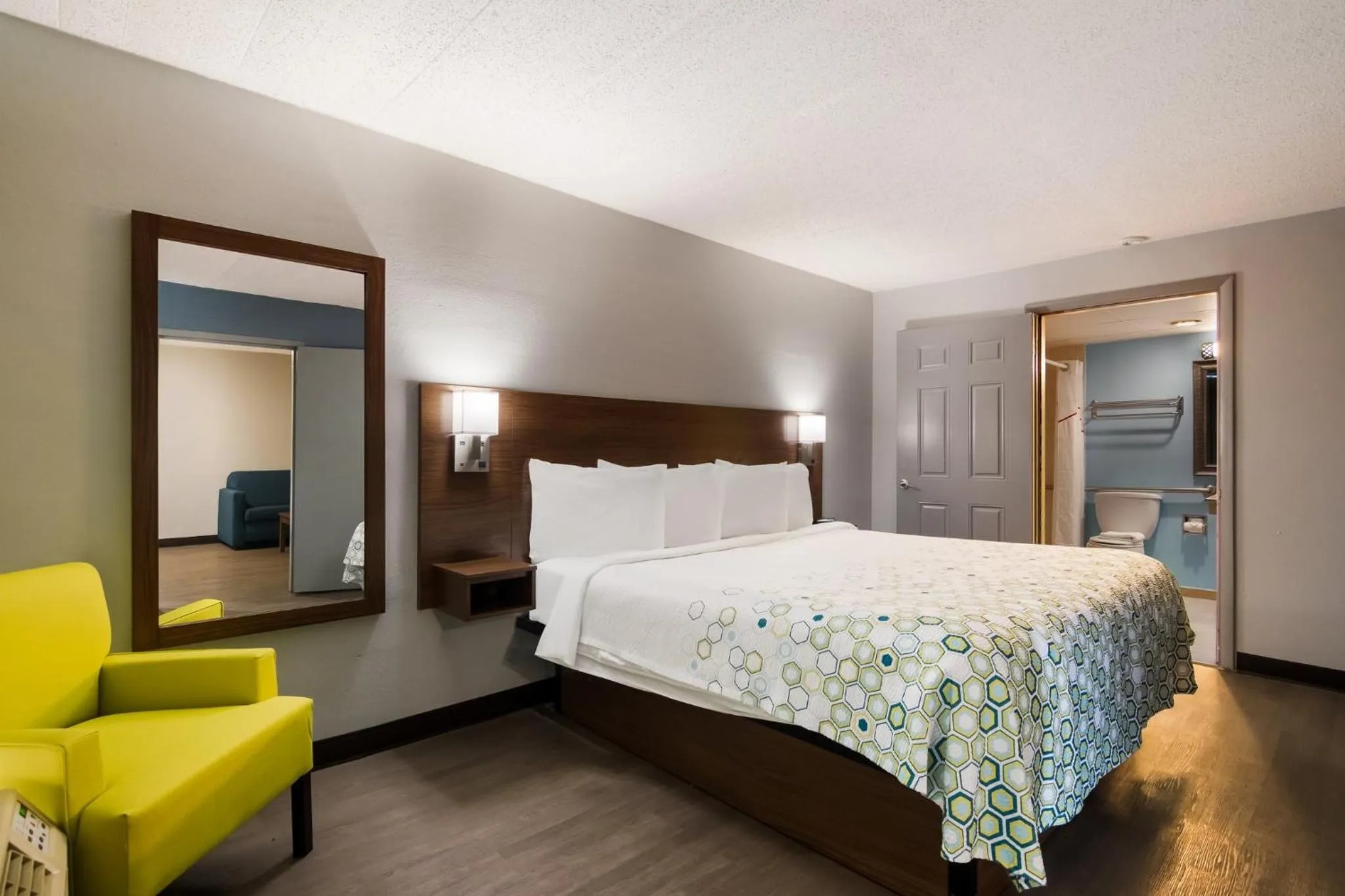 Bedroom, Bed in HomeTowne Studios by Red Roof Vero Beach - I-95