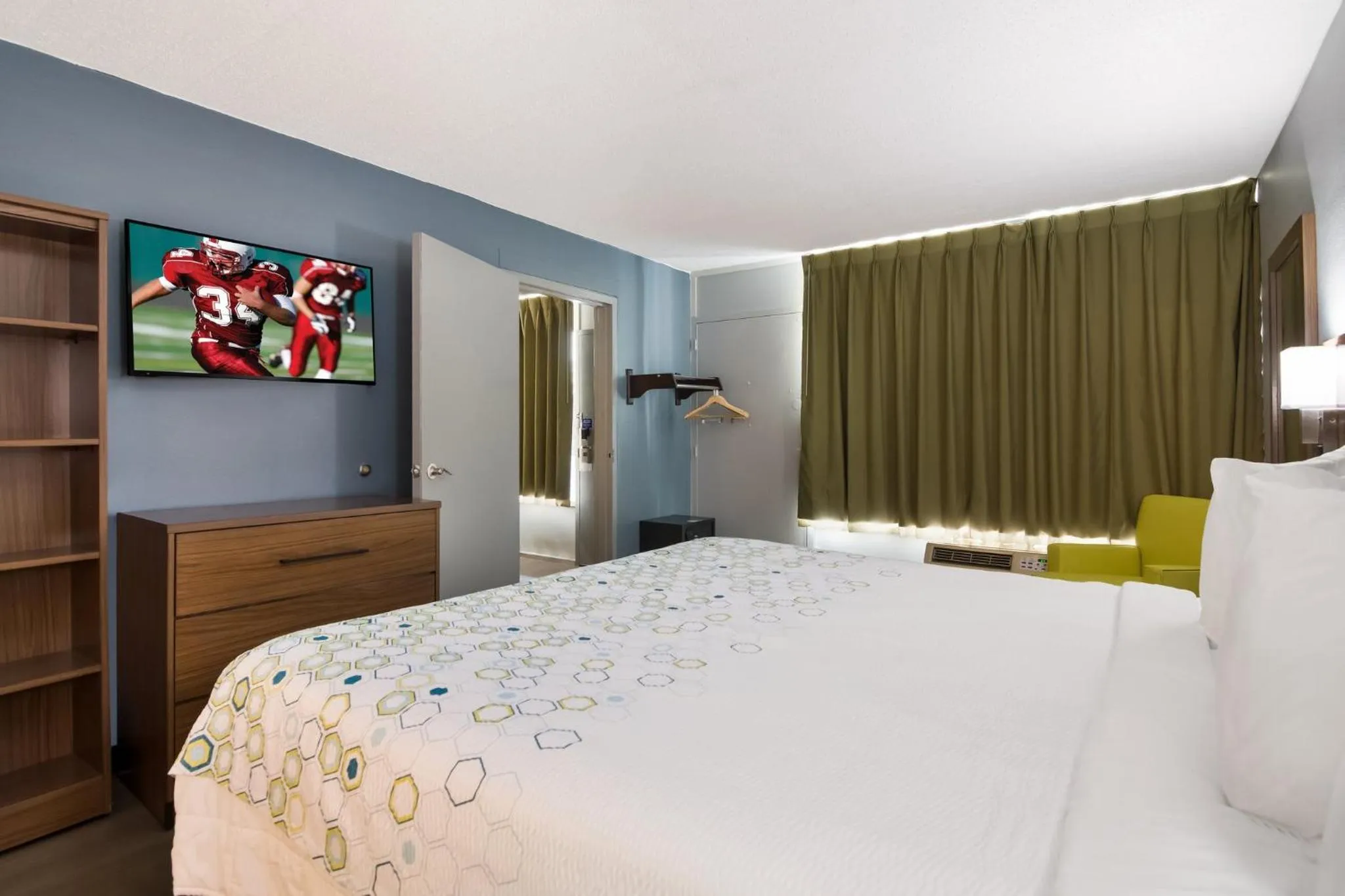 Bedroom, Bed in HomeTowne Studios by Red Roof Vero Beach - I-95