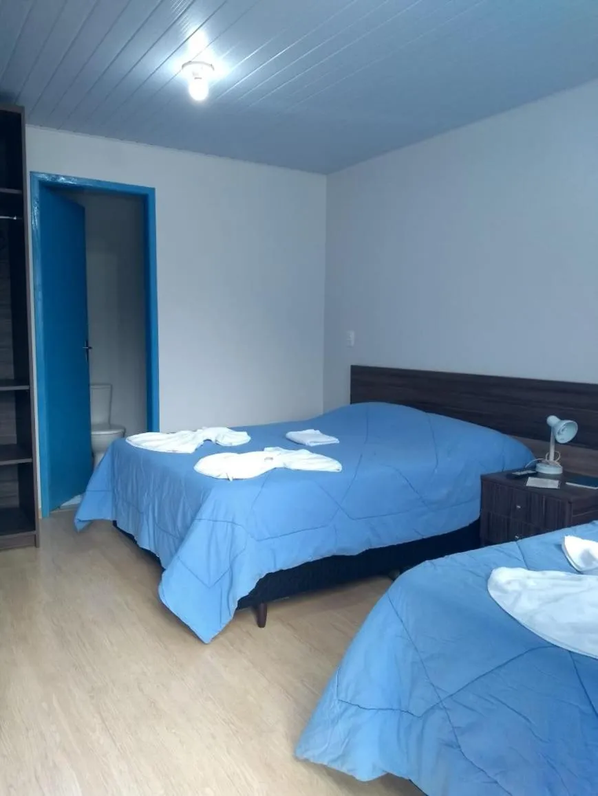 Bed in Pousada Recanto Alpino