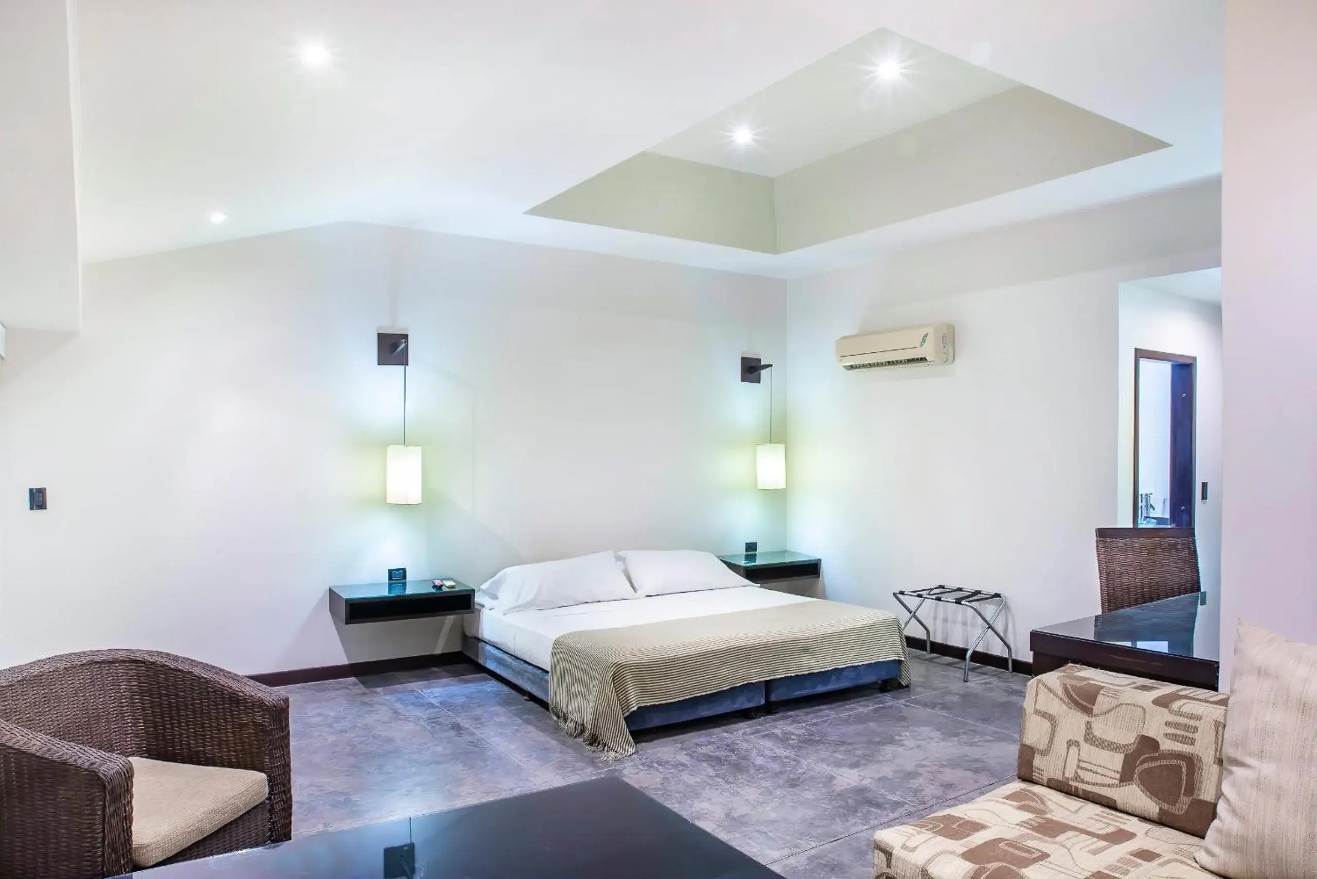 Photo of the whole room, Bed in Hotel Santorini Express y Cabañas Photo of the whole room, Bed in Hotel Santorini Express y Cabañas