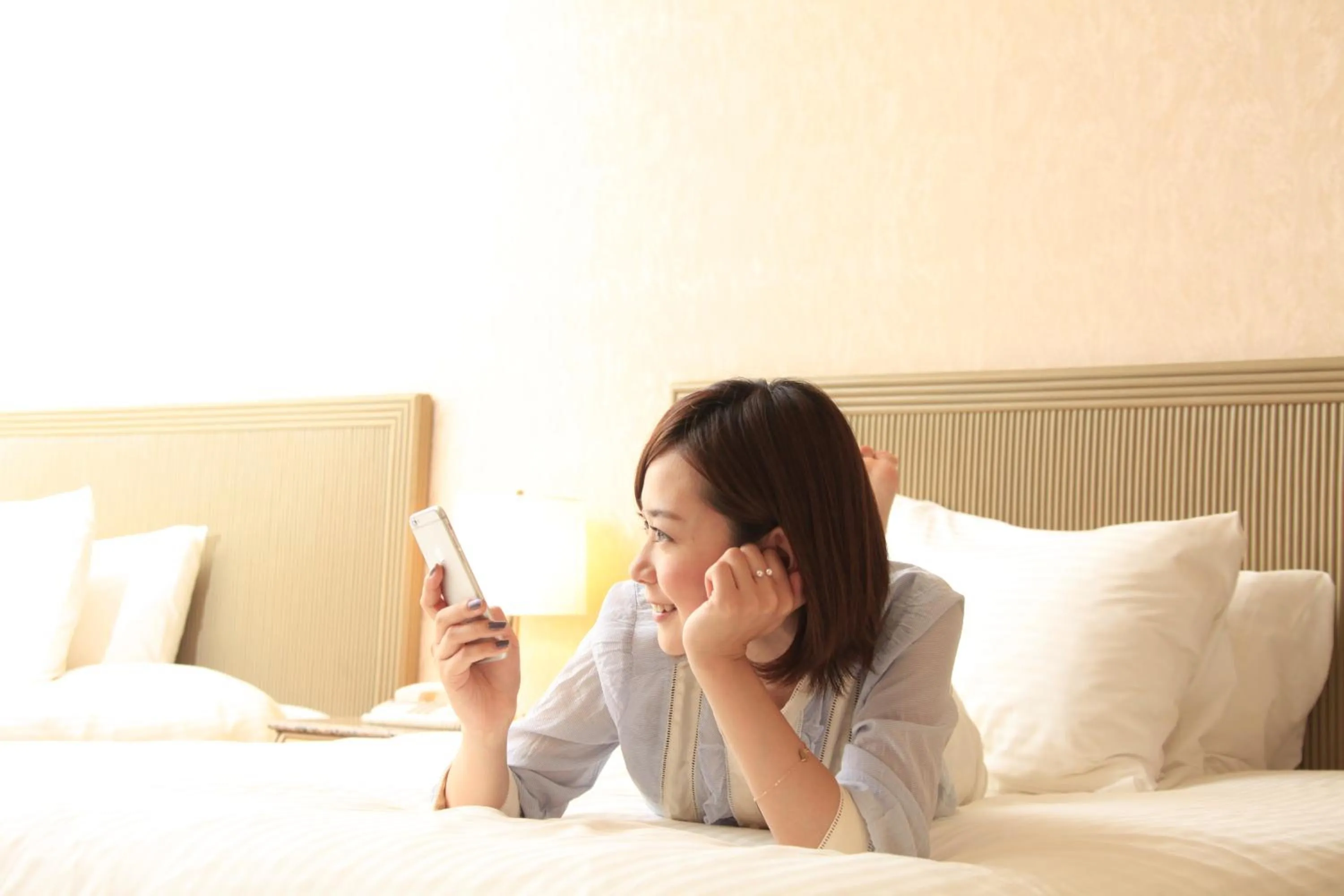 Photo of the whole room, Bed in Quintessa Hotel Sasebo